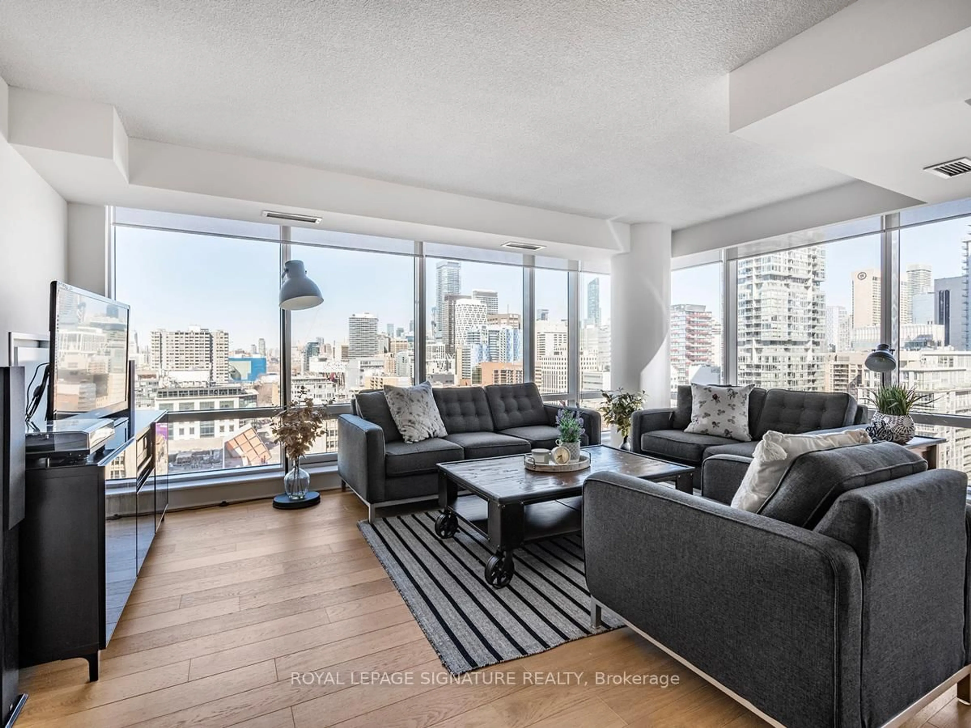 Living room with furniture, unknown for 295 Adelaide St #1804, Toronto Ontario M5V 0L4