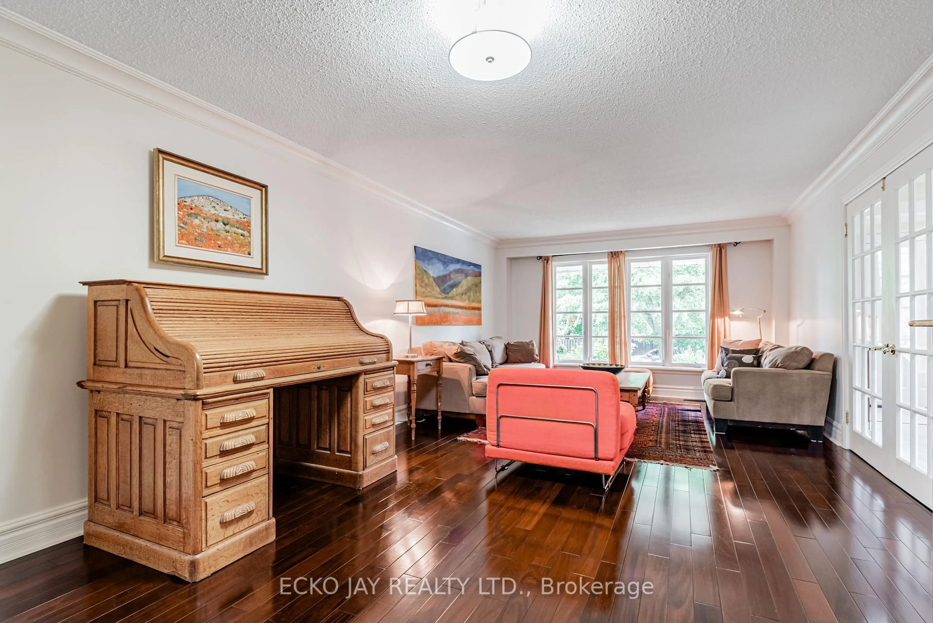 Living room with furniture, wood/laminate floor for 75 Barrydale Cres, Toronto Ontario M3B 3E3