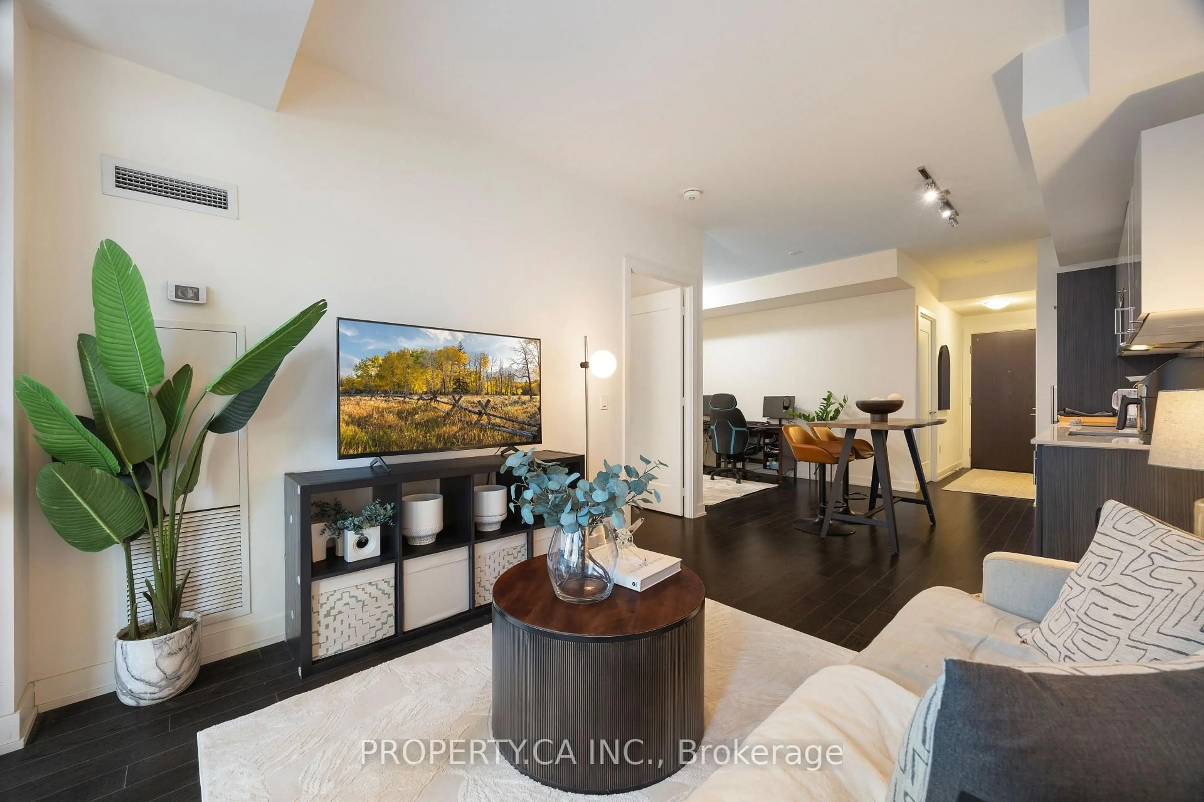 Living room with furniture, wood/laminate floor for 330 Richmond St #319, Toronto Ontario M5V 0M4