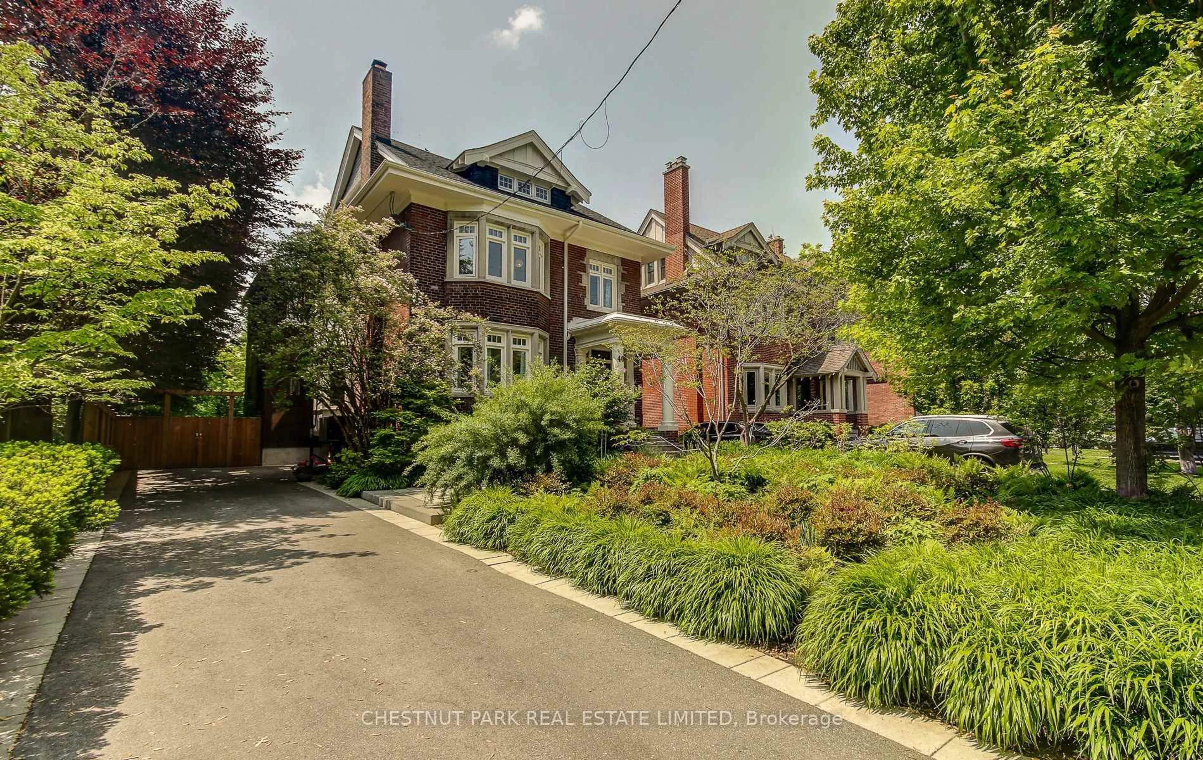 Home with brick exterior material, street for 40 Warren Rd, Toronto Ontario M4V 2R5