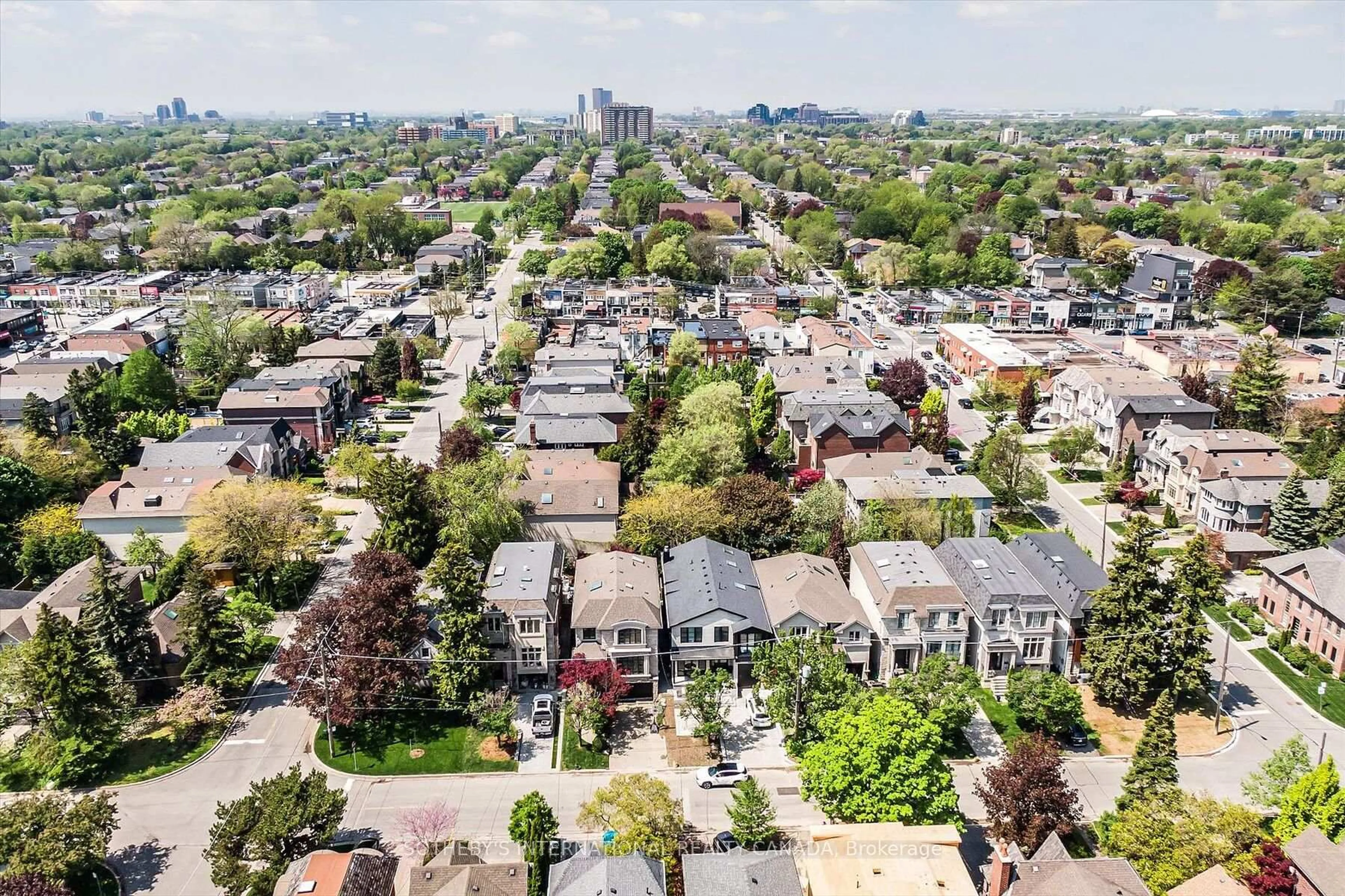 A pic from outside/outdoor area/front of a property/back of a property/a pic from drone, street for 446 Elm Rd, Toronto Ontario M3W 3W9