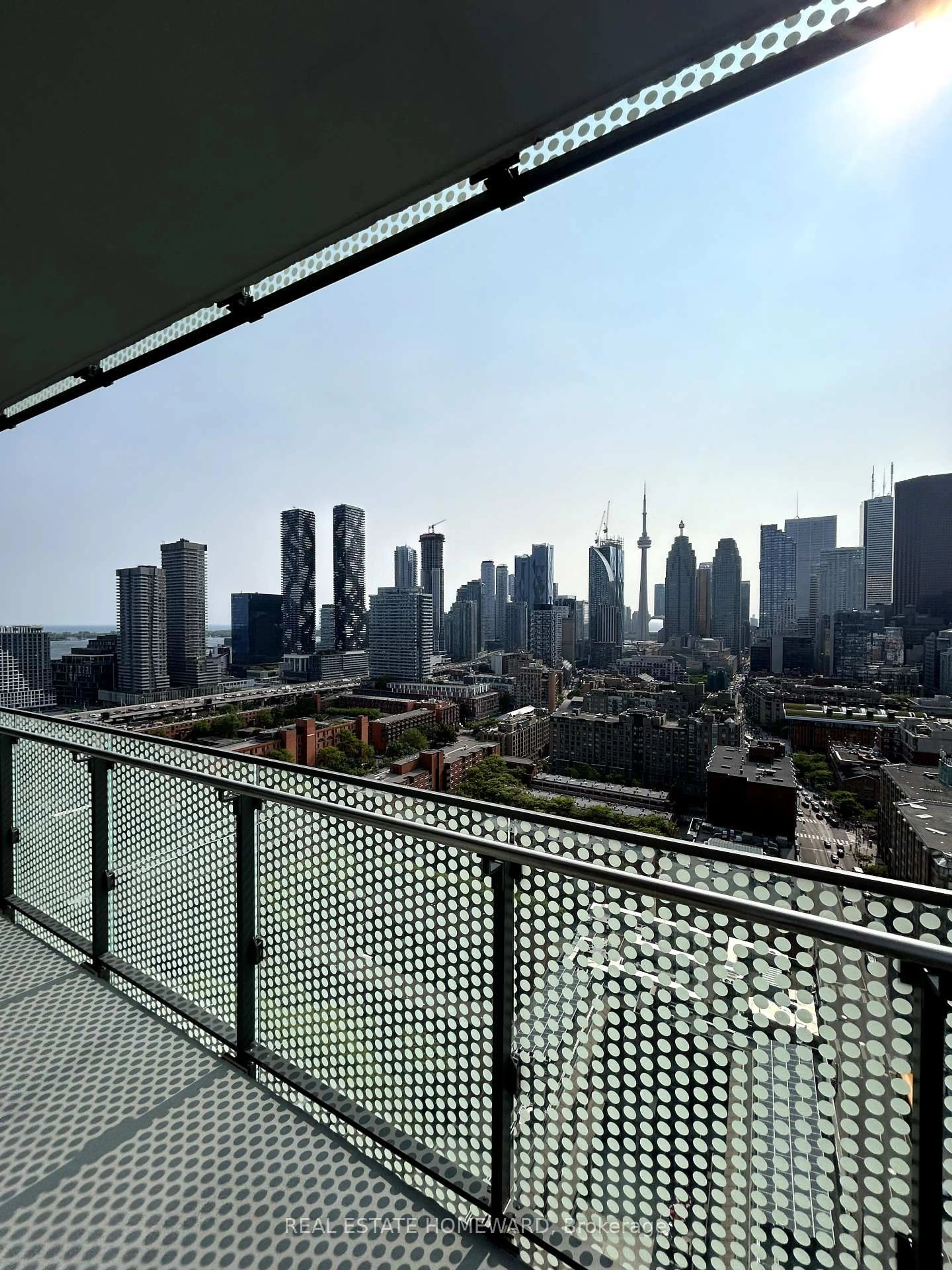 Balcony in the apartment, city buildings view from balcony for 135 Lower Sherbourne St #2433W, Toronto Ontario M5A 1Y4