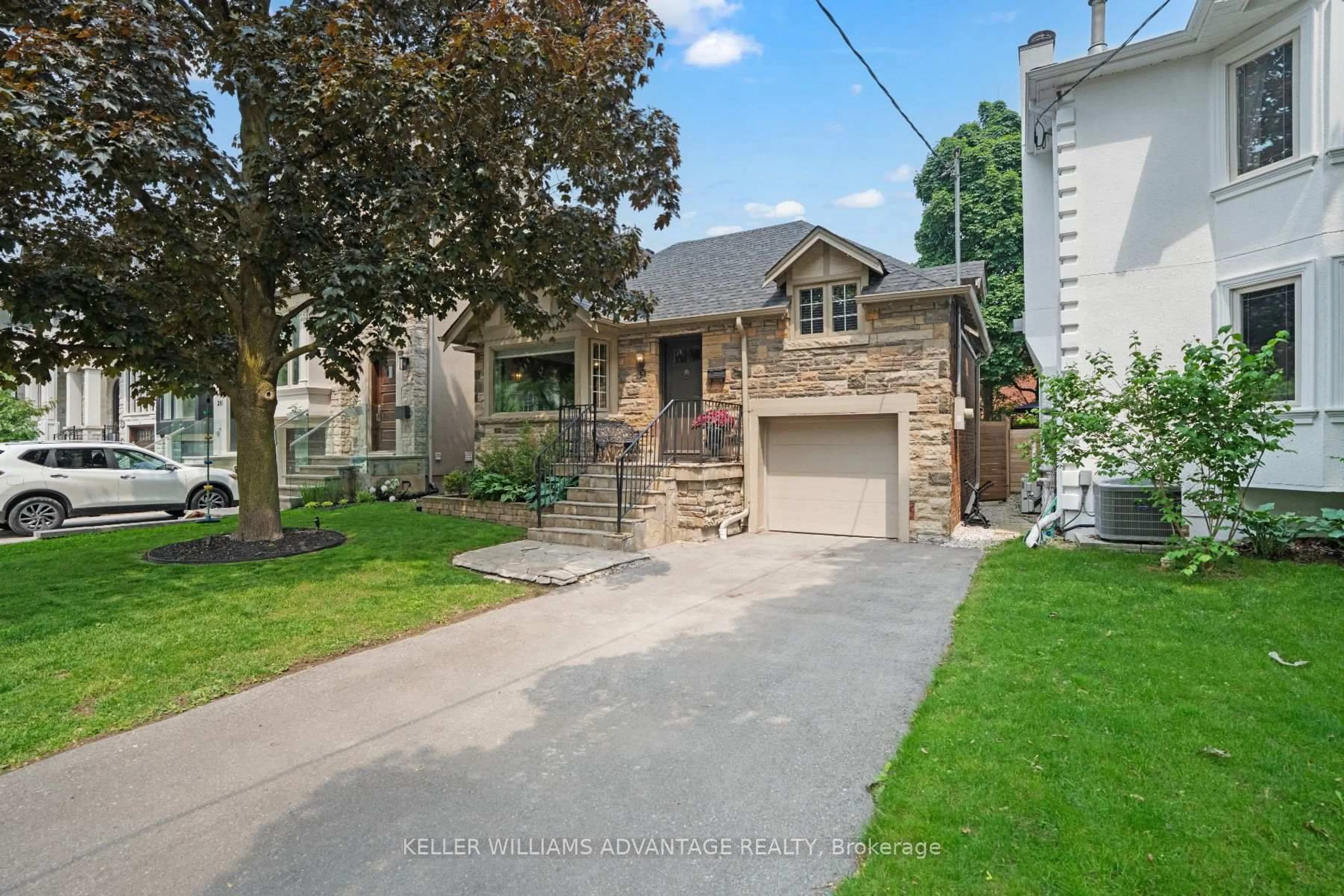 Home with brick exterior material, street for 387 Elm Rd, Toronto Ontario M5M 3V9