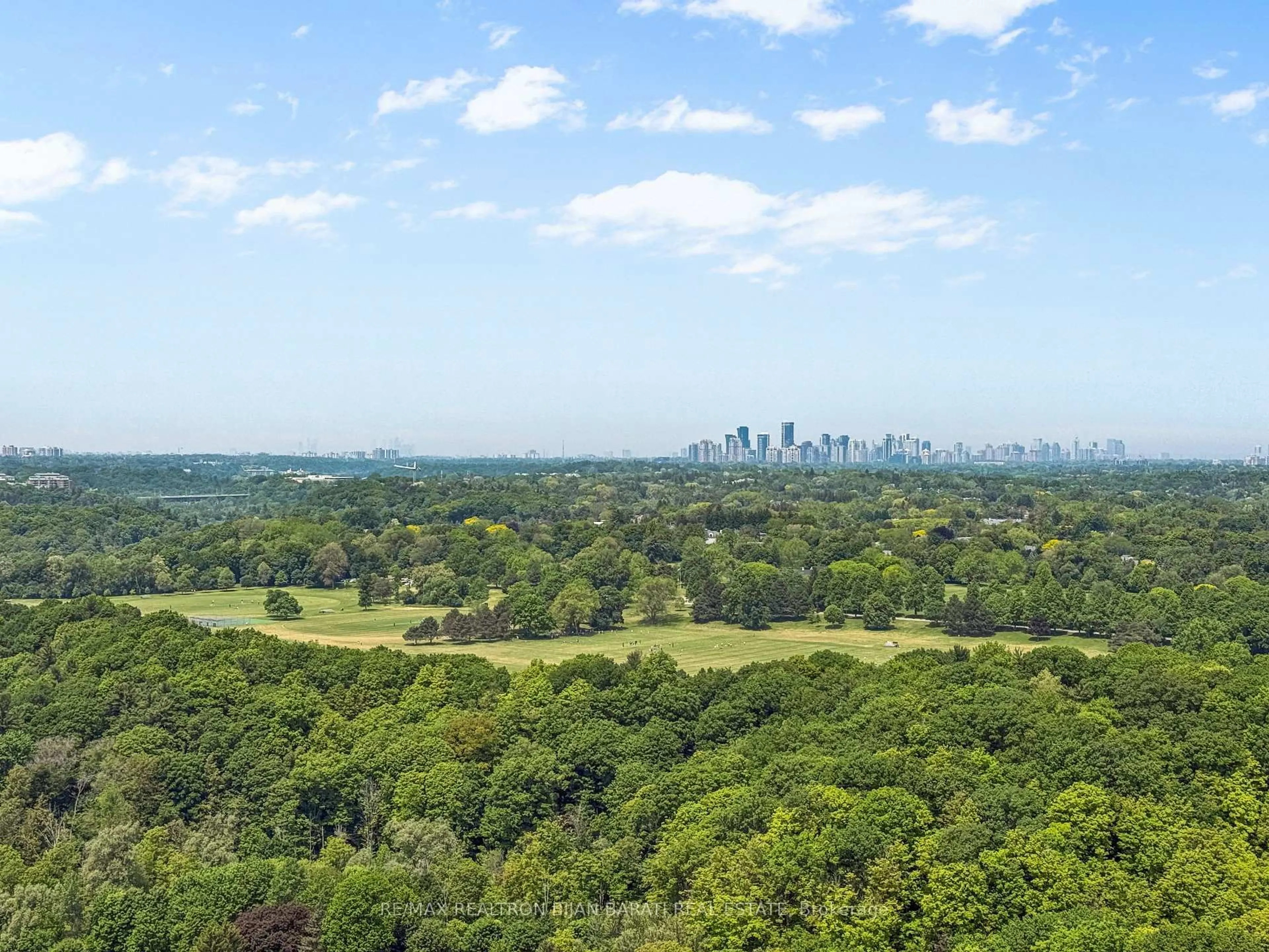 A pic from outside/outdoor area/front of a property/back of a property/a pic from drone, forest/trees view for 10 Inn On The Park Dr #2401, Toronto Ontario M3C 0P9
