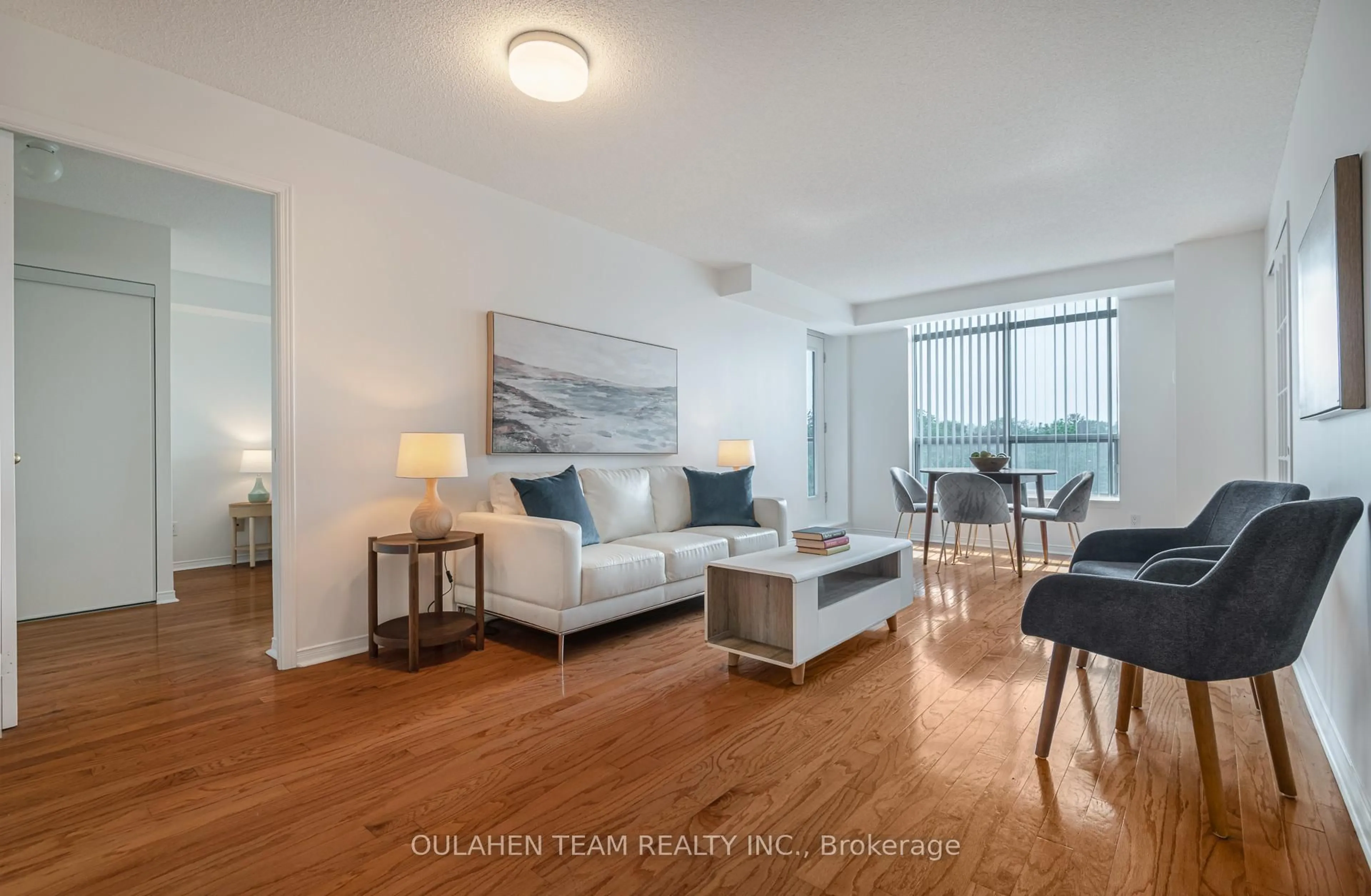 Living room with furniture, wood/laminate floor for 233 Beecroft Rd #508, Toronto Ontario M2N 6Z9