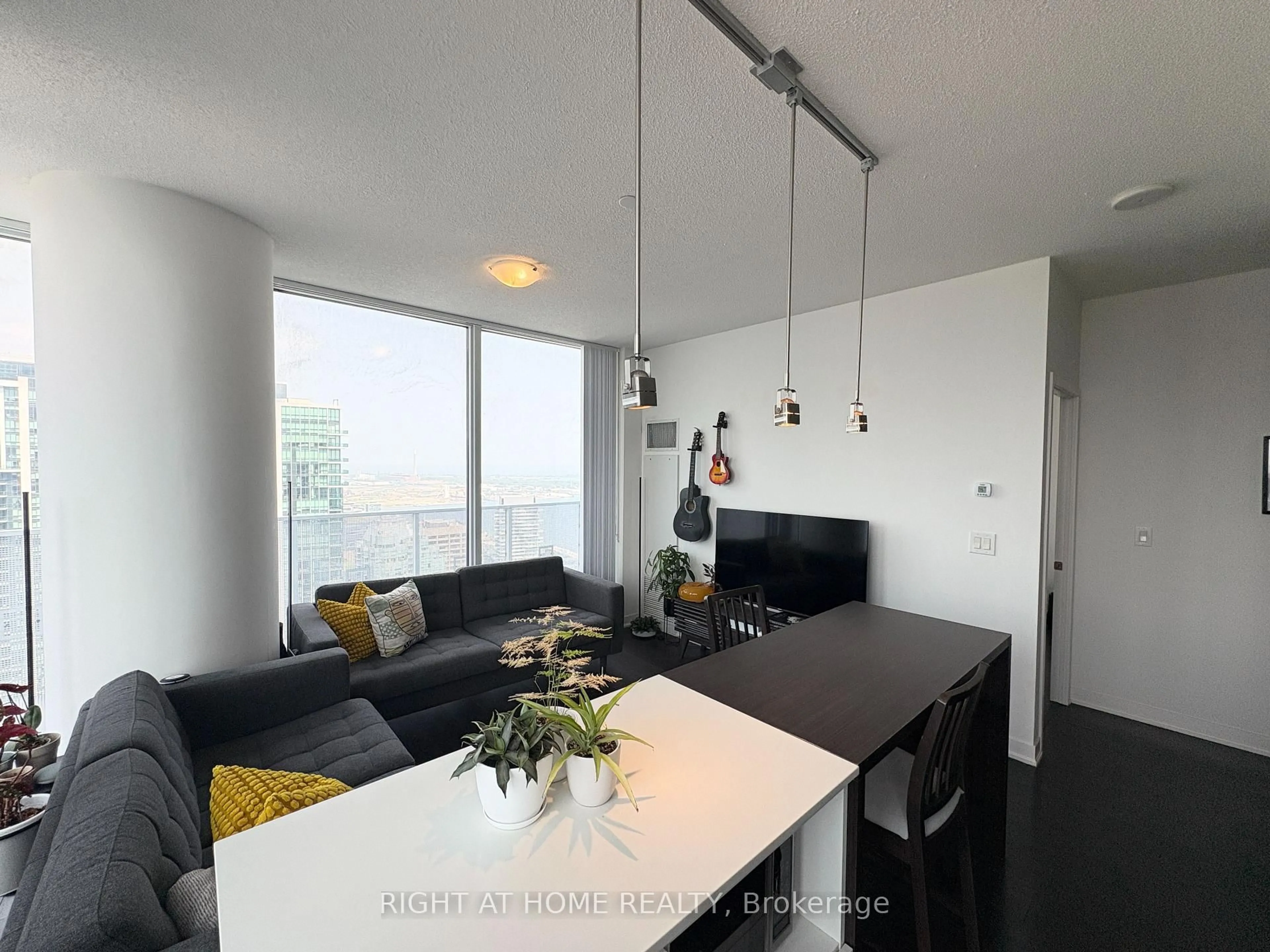 Living room with furniture, unknown for 88 Harbour St #4904, Toronto Ontario M5J 1B7