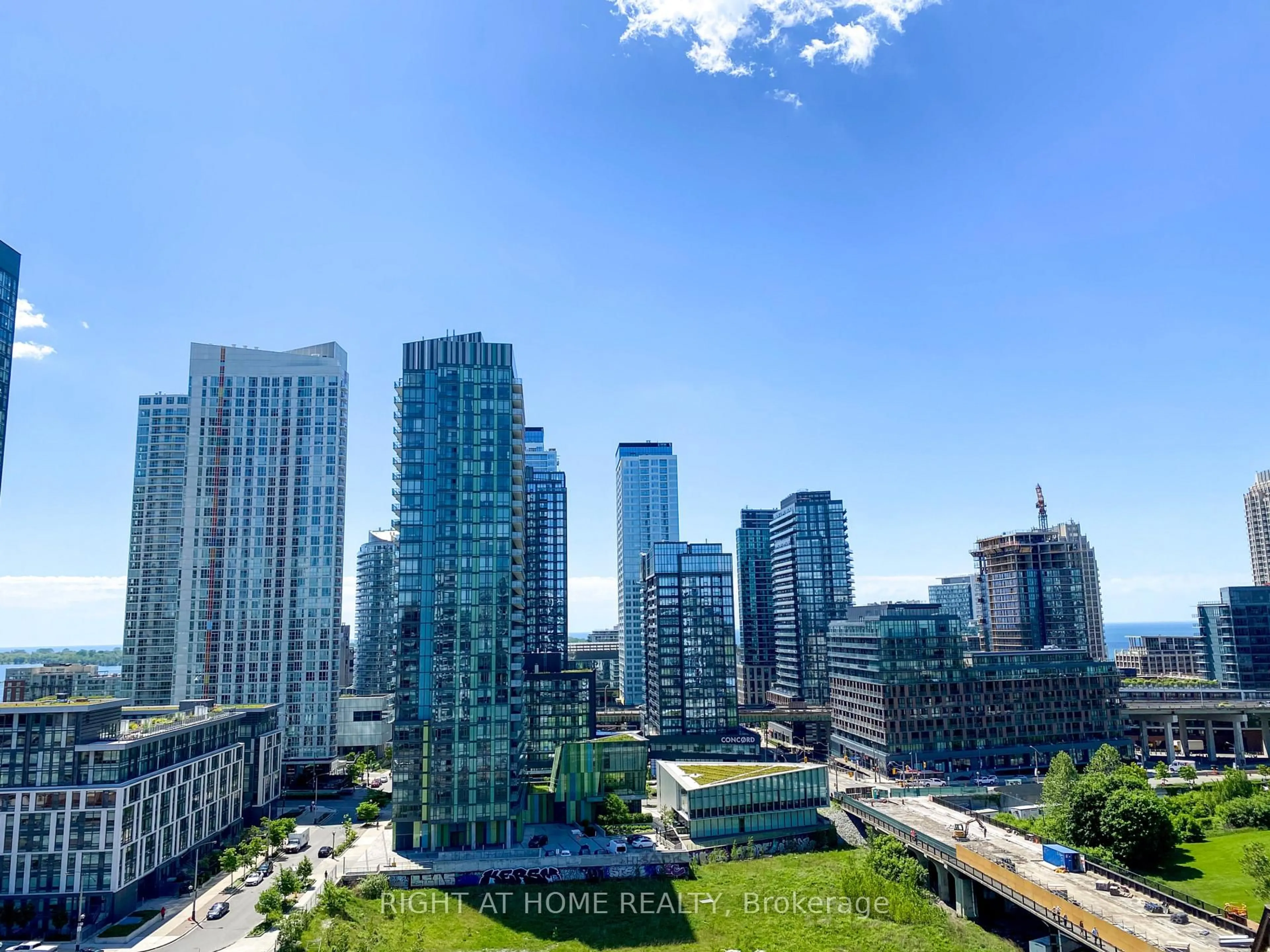 A pic from outside/outdoor area/front of a property/back of a property/a pic from drone, city buildings view from balcony for 576 Front St #1107, Toronto Ontario M5V 0P8