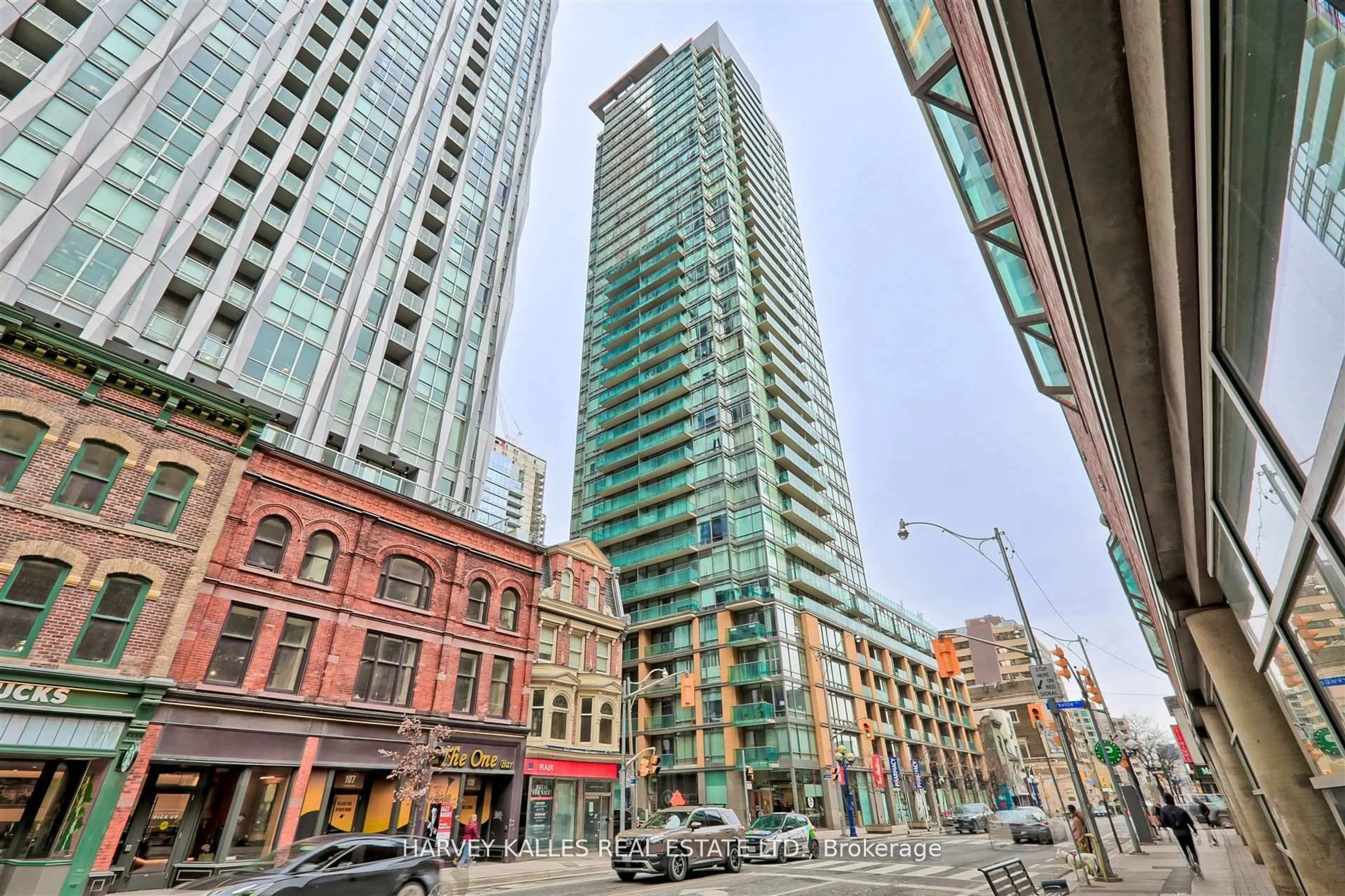 Patio, city buildings view from balcony for 18 Yorkville Ave #2906, Toronto Ontario M4W 1L4