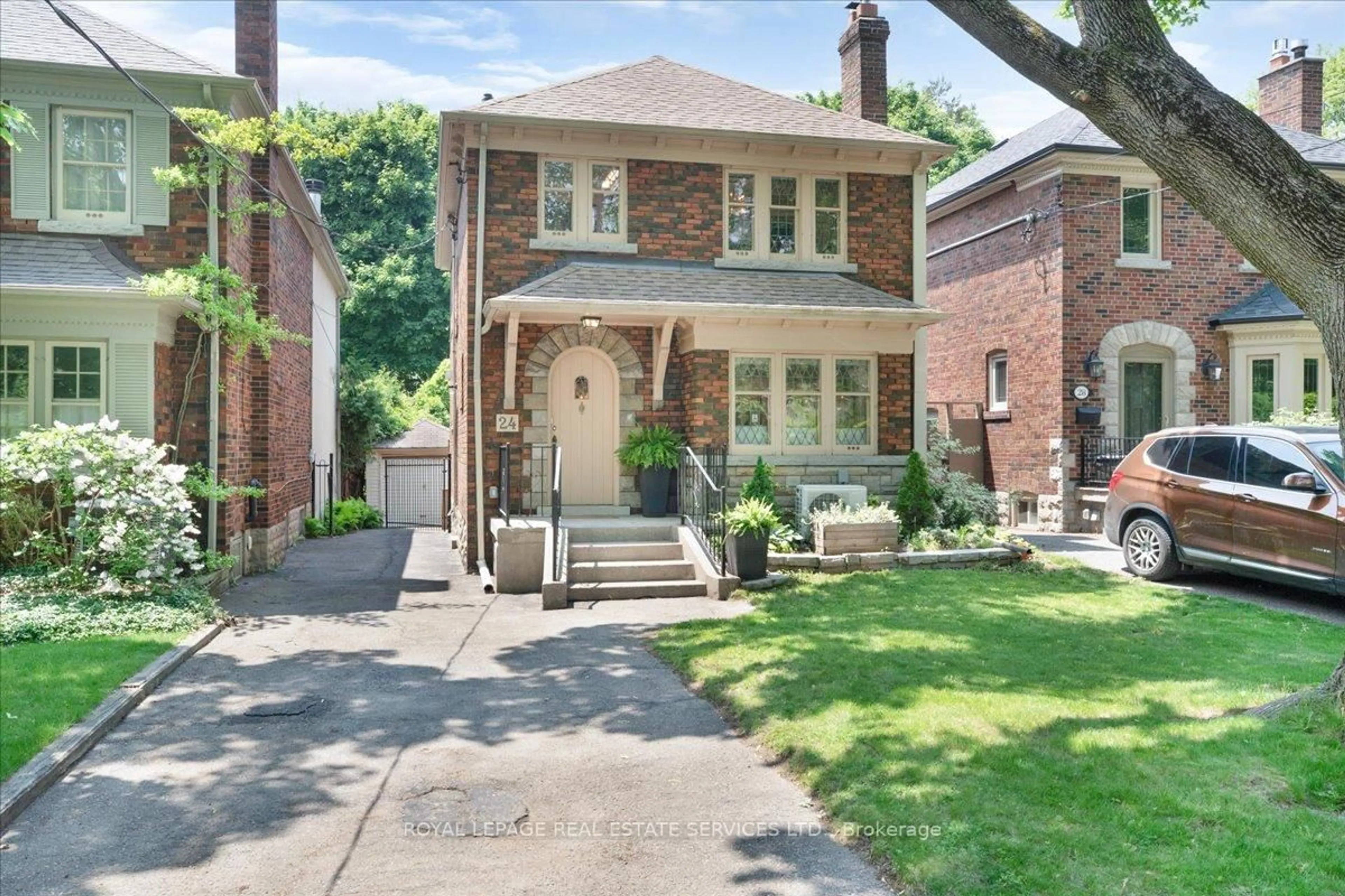 Home with brick exterior material, street for 24 Rolph Rd, Toronto Ontario M4G 3M6