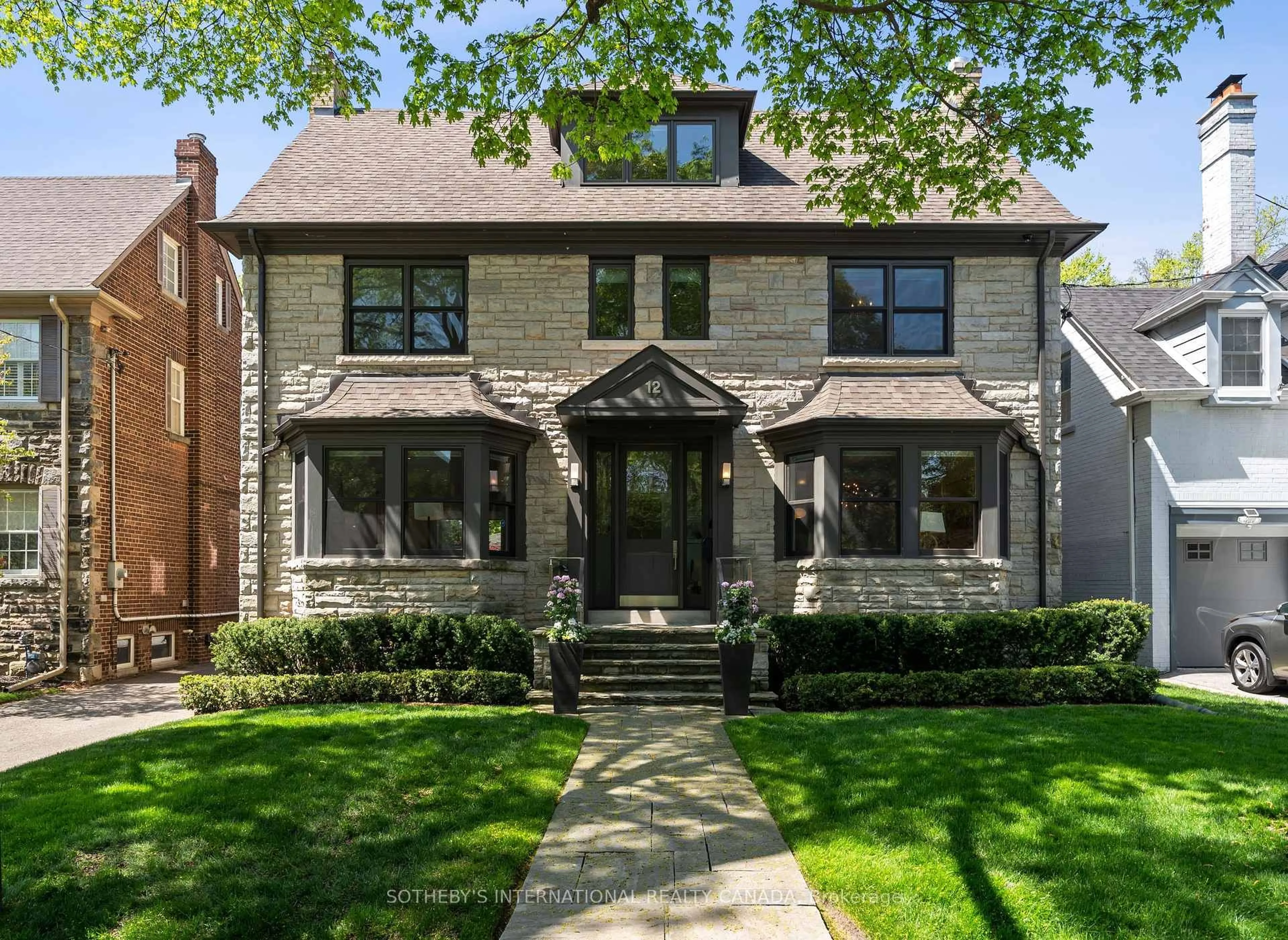 Home with brick exterior material, street for 12 Highland Cres, Toronto Ontario M4W 2S7