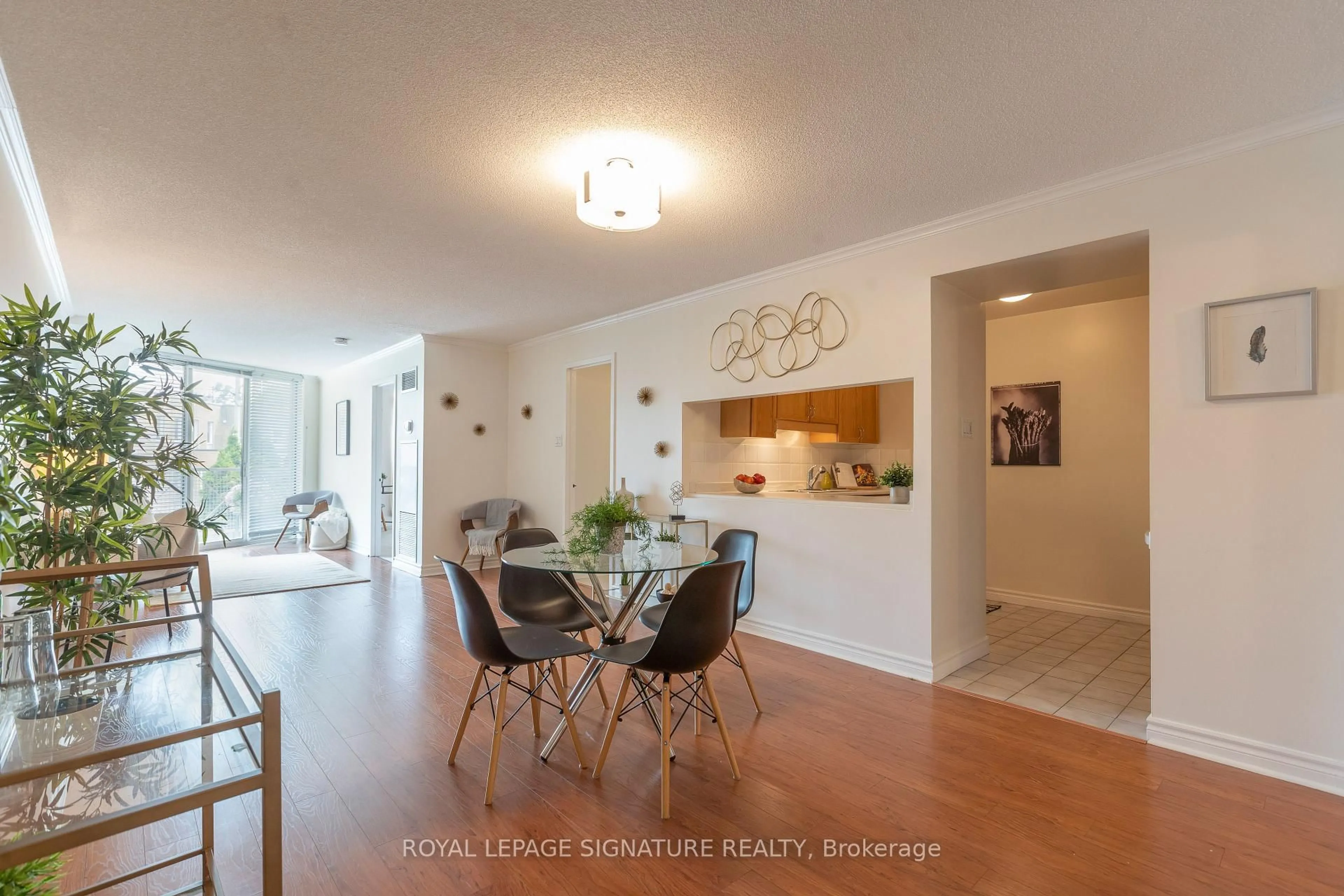 Dining room, wood/laminate floor for 356 McRae Dr #206, Toronto Ontario M4G 4G4