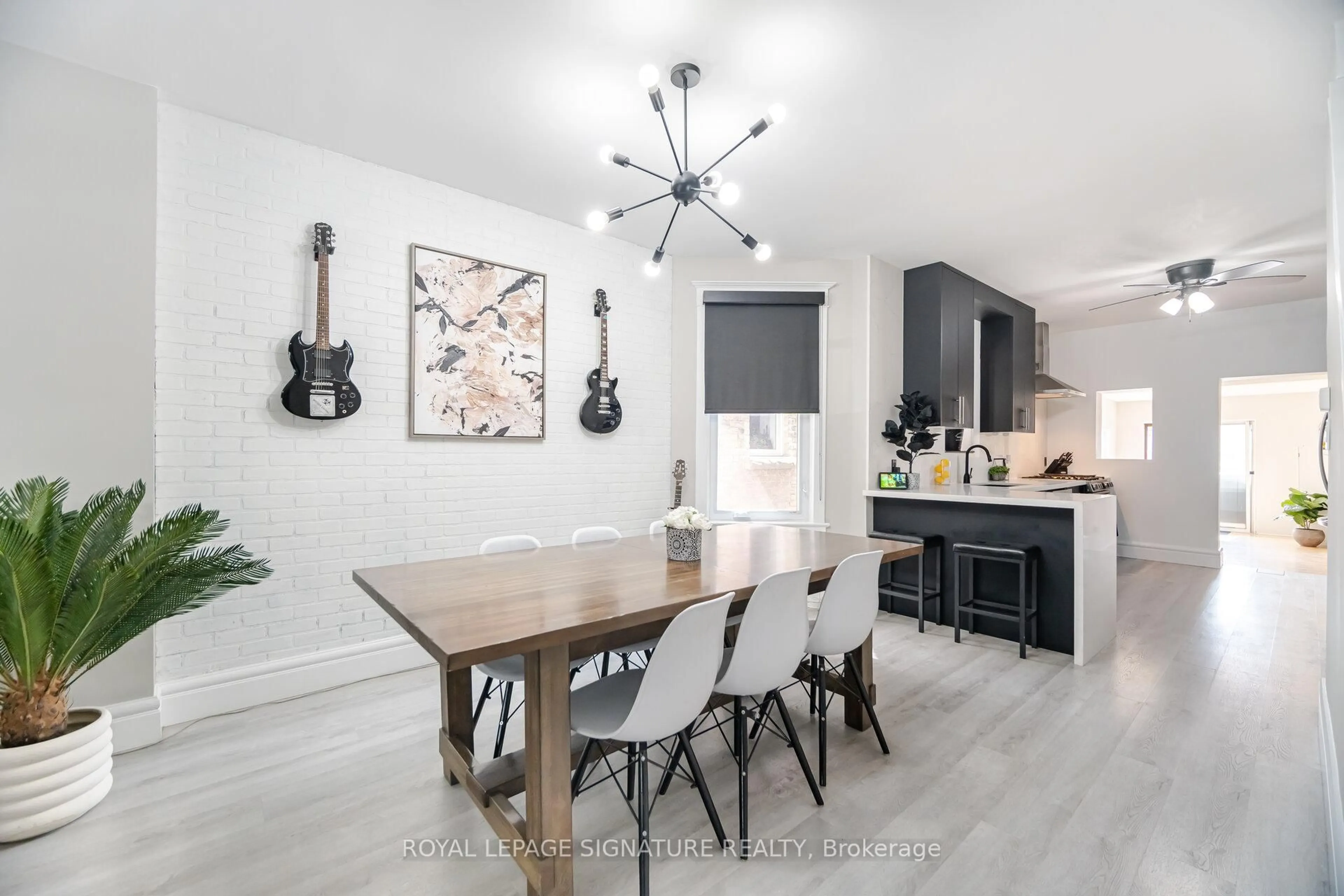 Open concept kitchen, wood/laminate floor for 30 Somerset Ave, Toronto Ontario M6H 2R4
