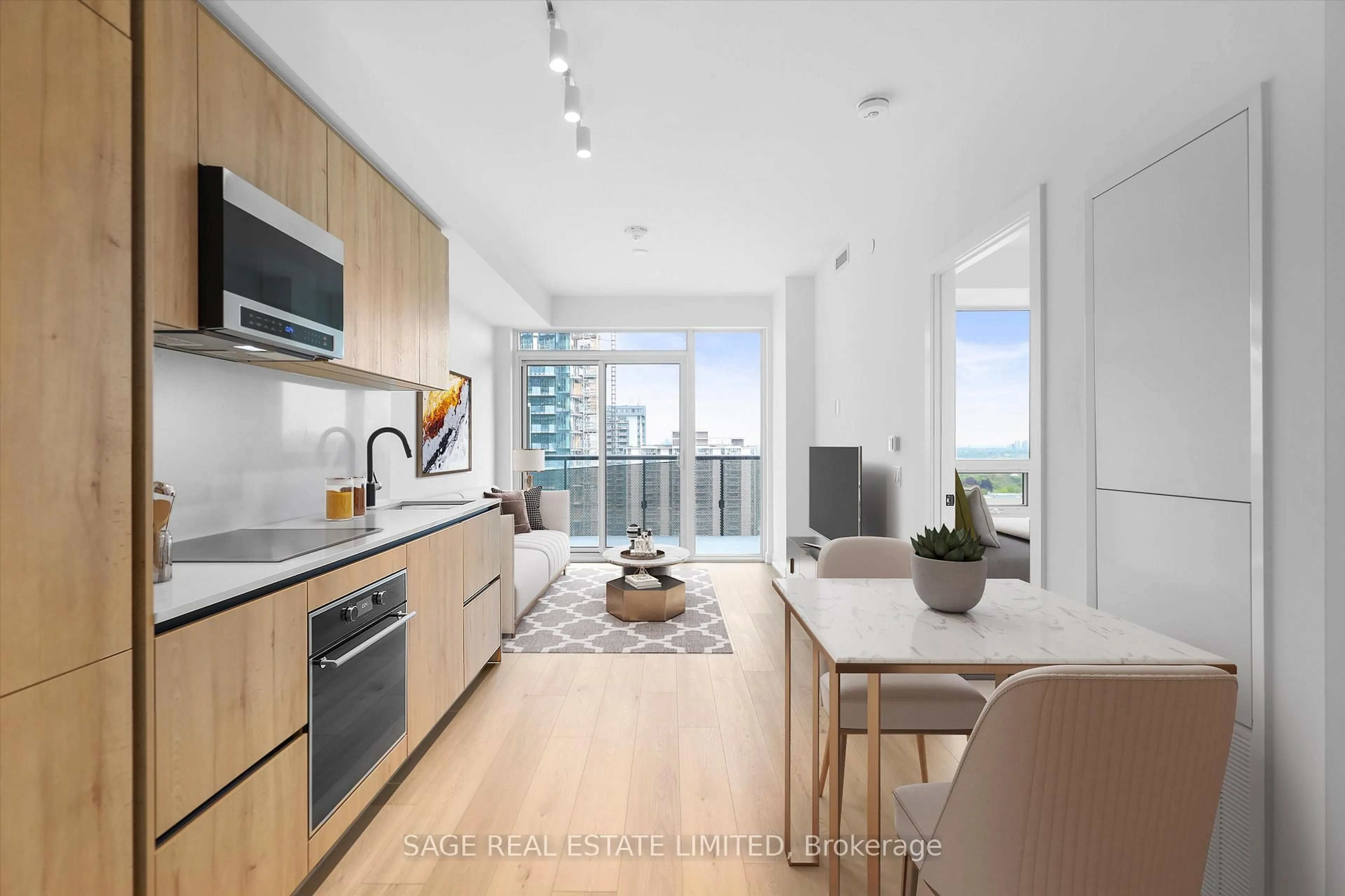 Open concept kitchen, wood/laminate floor for 117 Broadway Ave #2208, Toronto Ontario M4P 1V3