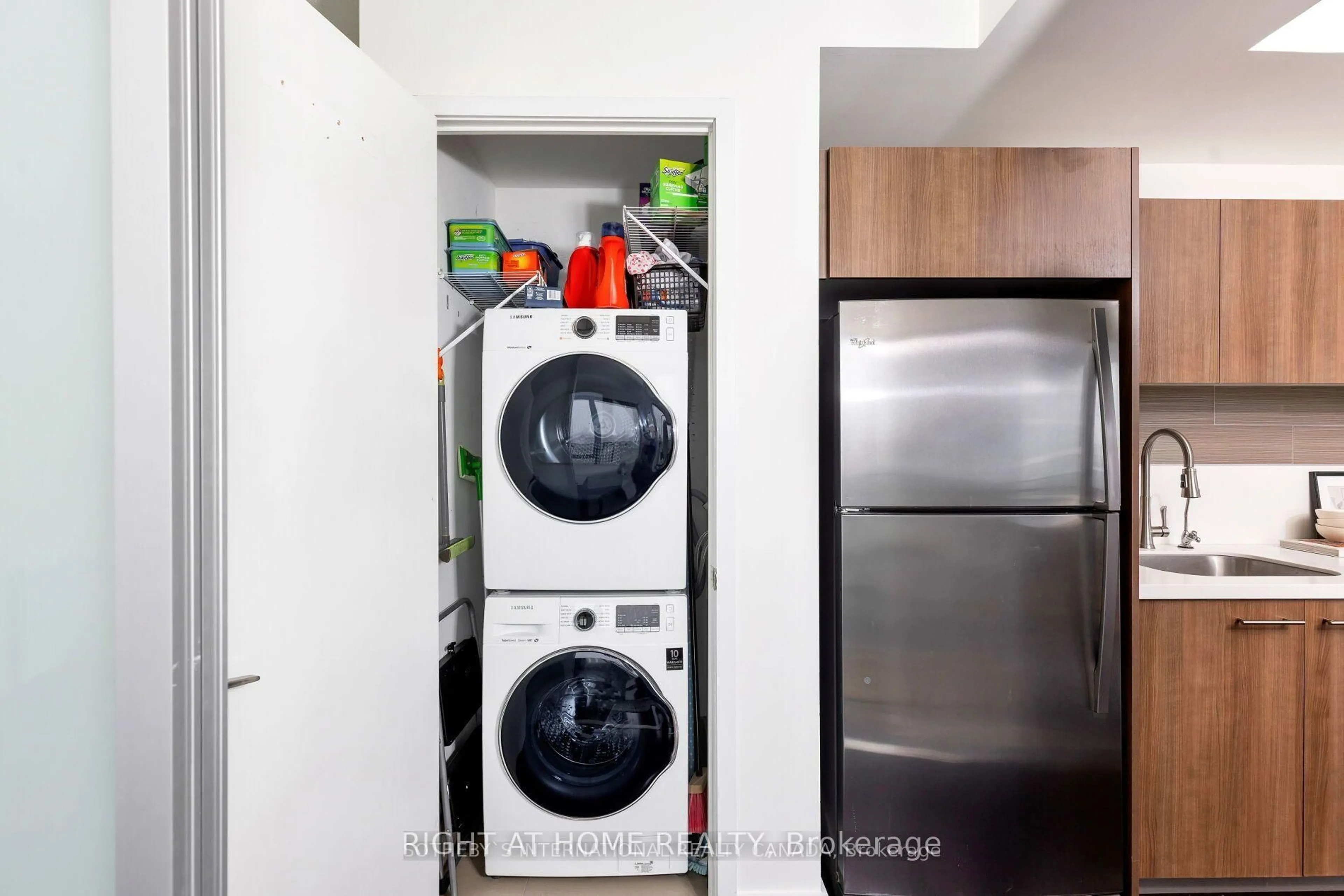Kitchen with laundary machines, unknown for 390 Cherry St #1405, Toronto Ontario M5A 0E2