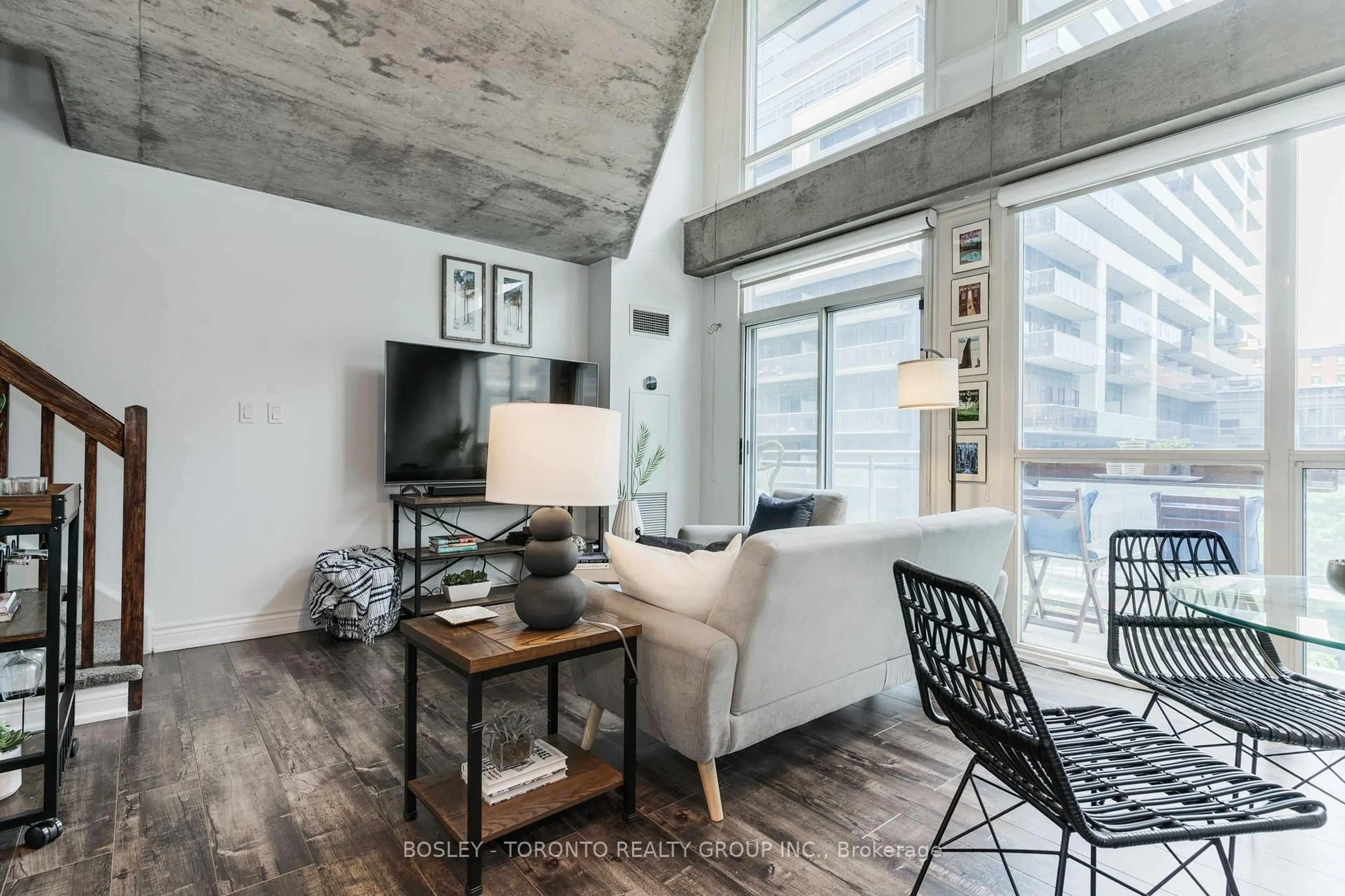 Living room with furniture, cement floor for 1029 King St St #419, Toronto Ontario M6K 3M9