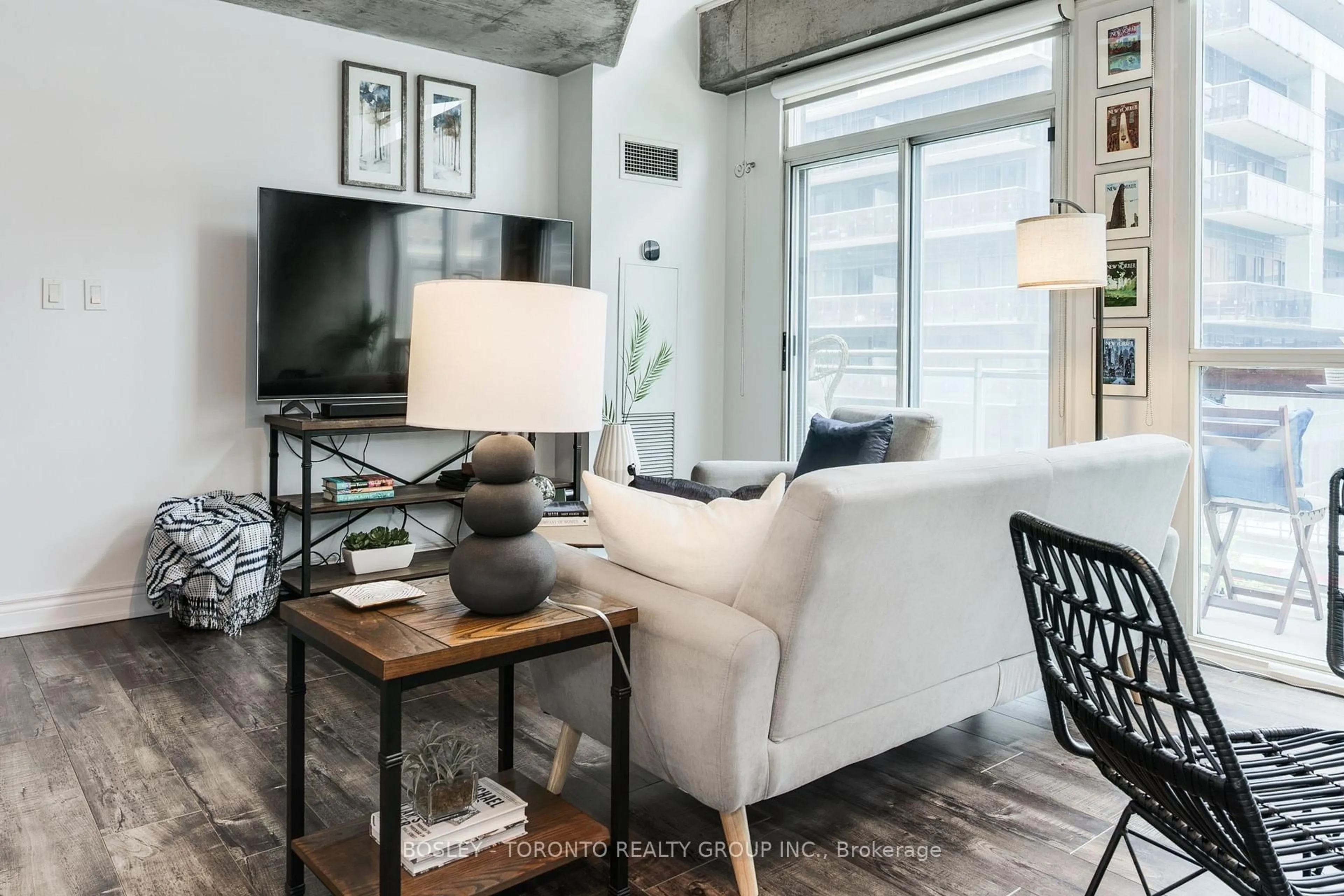 Living room with furniture, cement floor for 1029 King St St #419, Toronto Ontario M6K 3M9