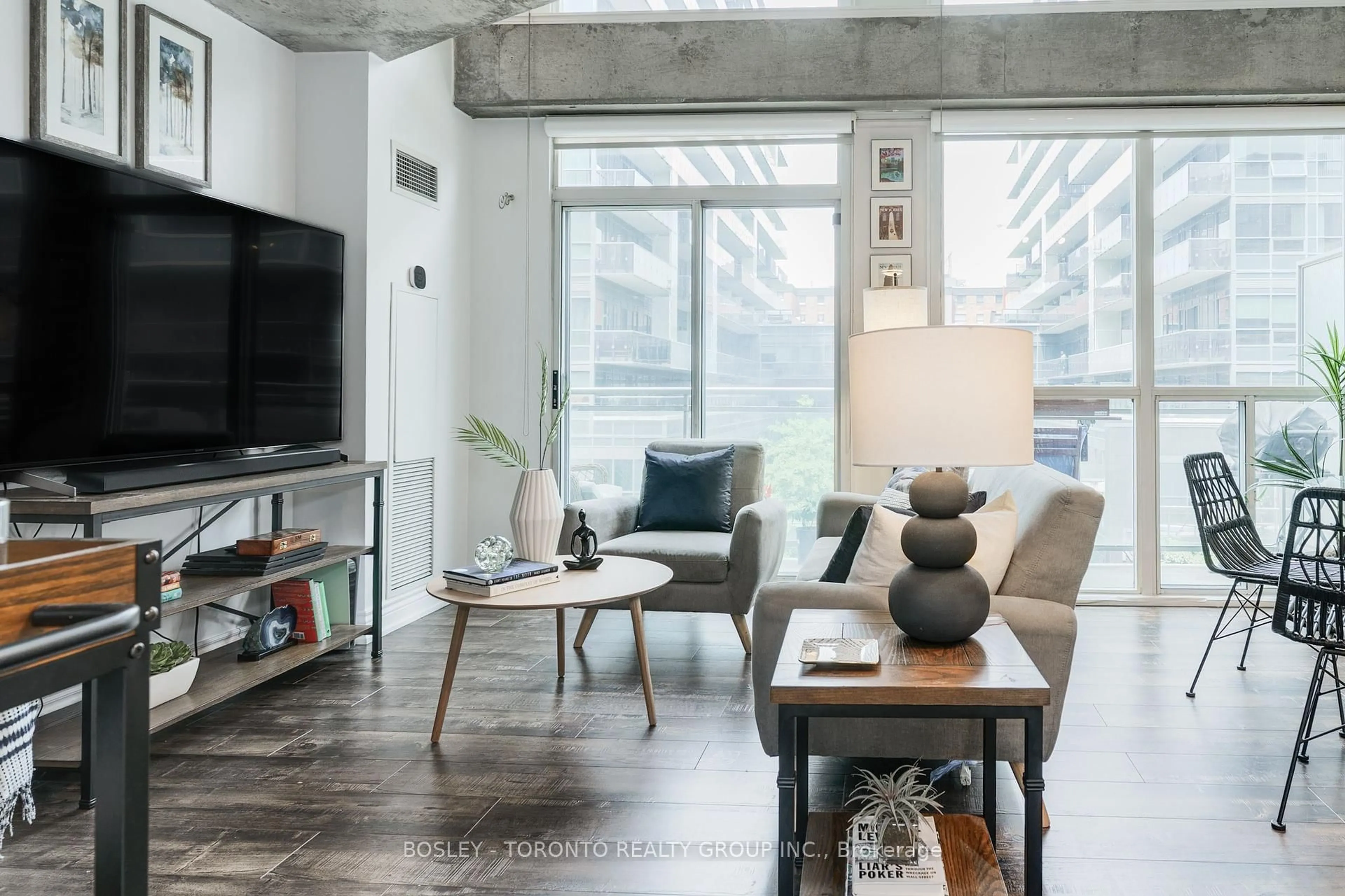 Living room with furniture, cement floor for 1029 King St St #419, Toronto Ontario M6K 3M9