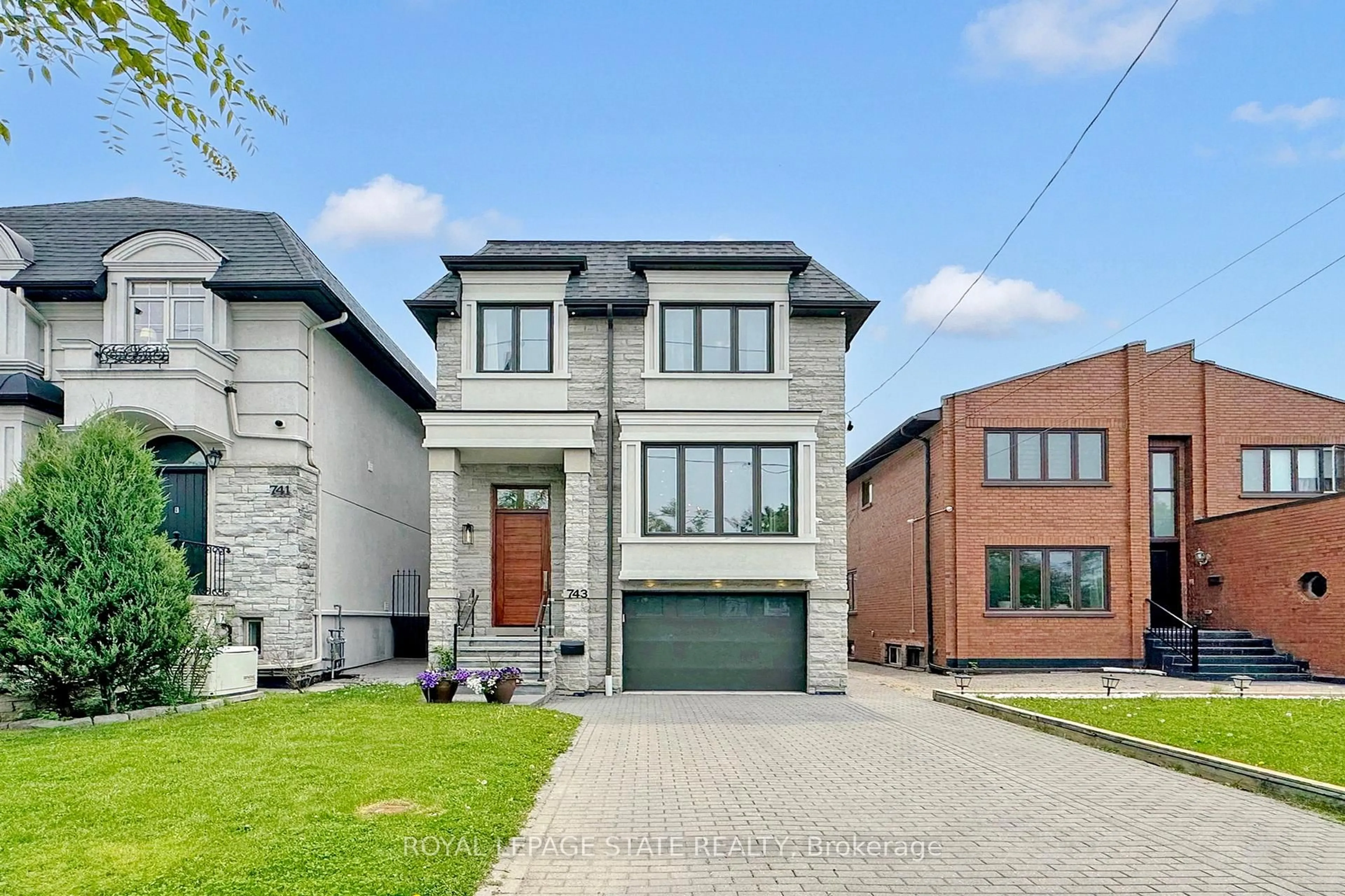 Home with brick exterior material, street for 743 Glencairn Ave, Toronto Ontario M6B 1Z9