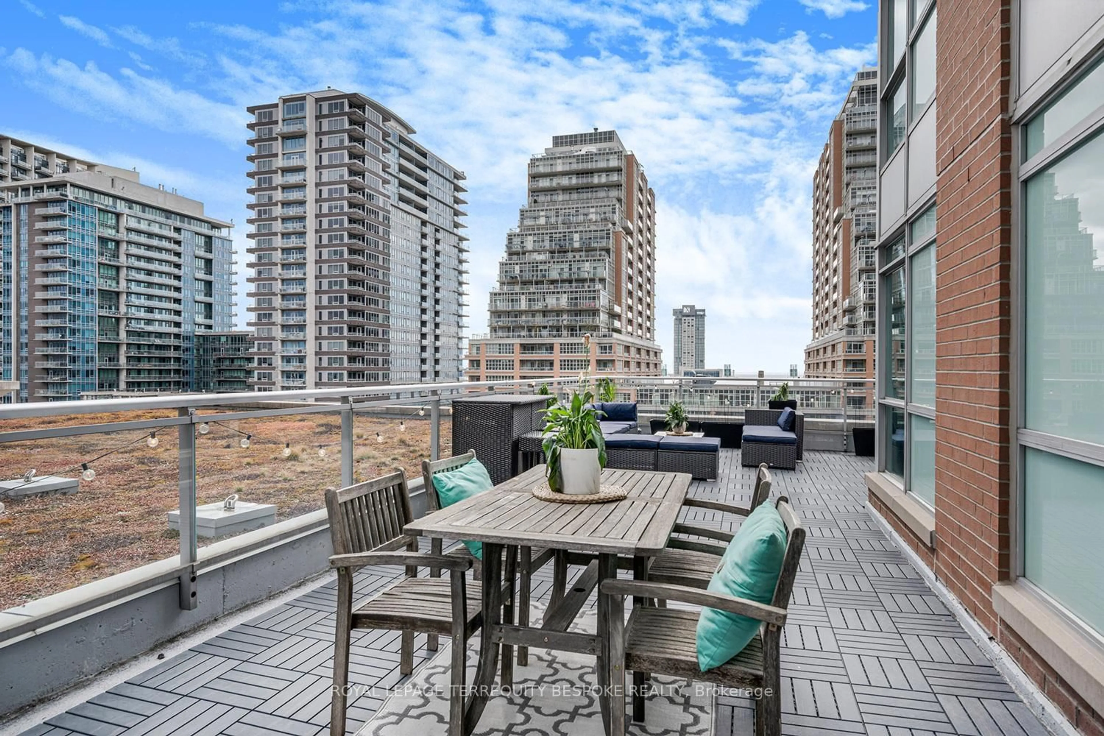Patio, city buildings view from balcony for 50 Lynn Williams St #604, Toronto Ontario M6K 3R9