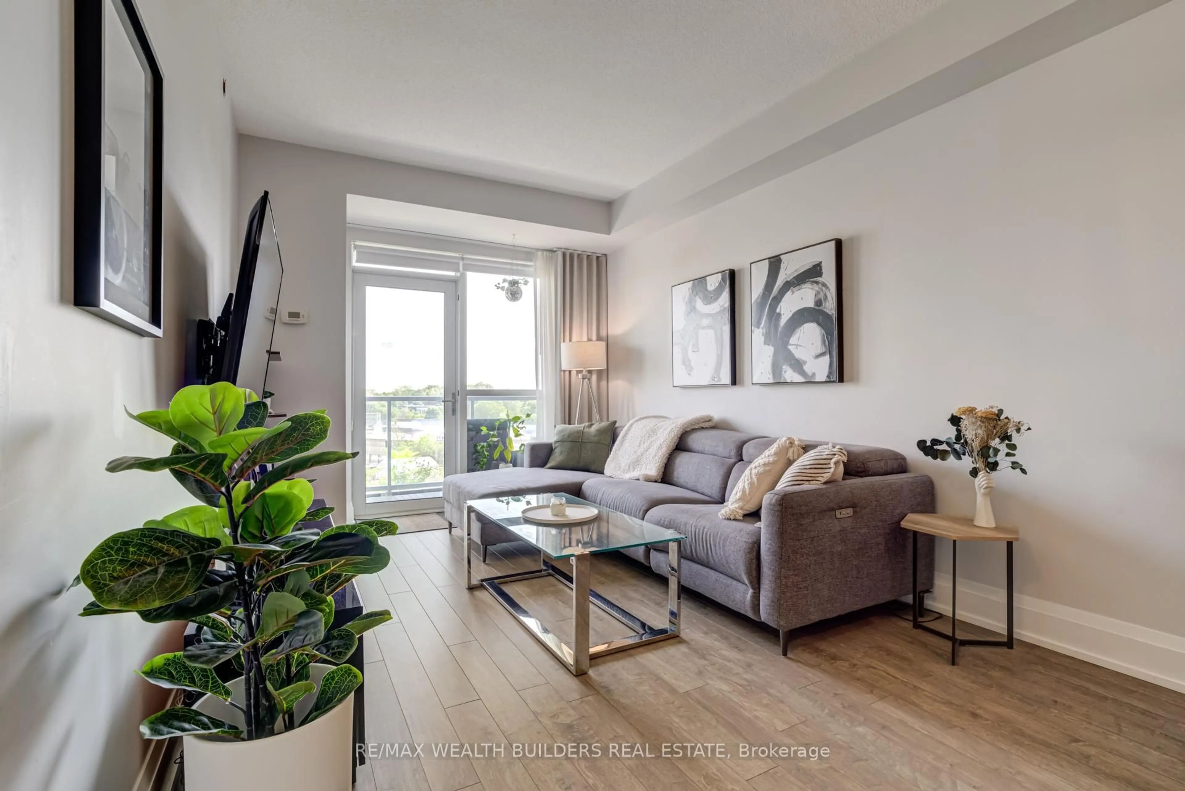 Living room with furniture, wood/laminate floor for 120 Harrison Garden Blvd #418, Toronto Ontario M2N 0H1