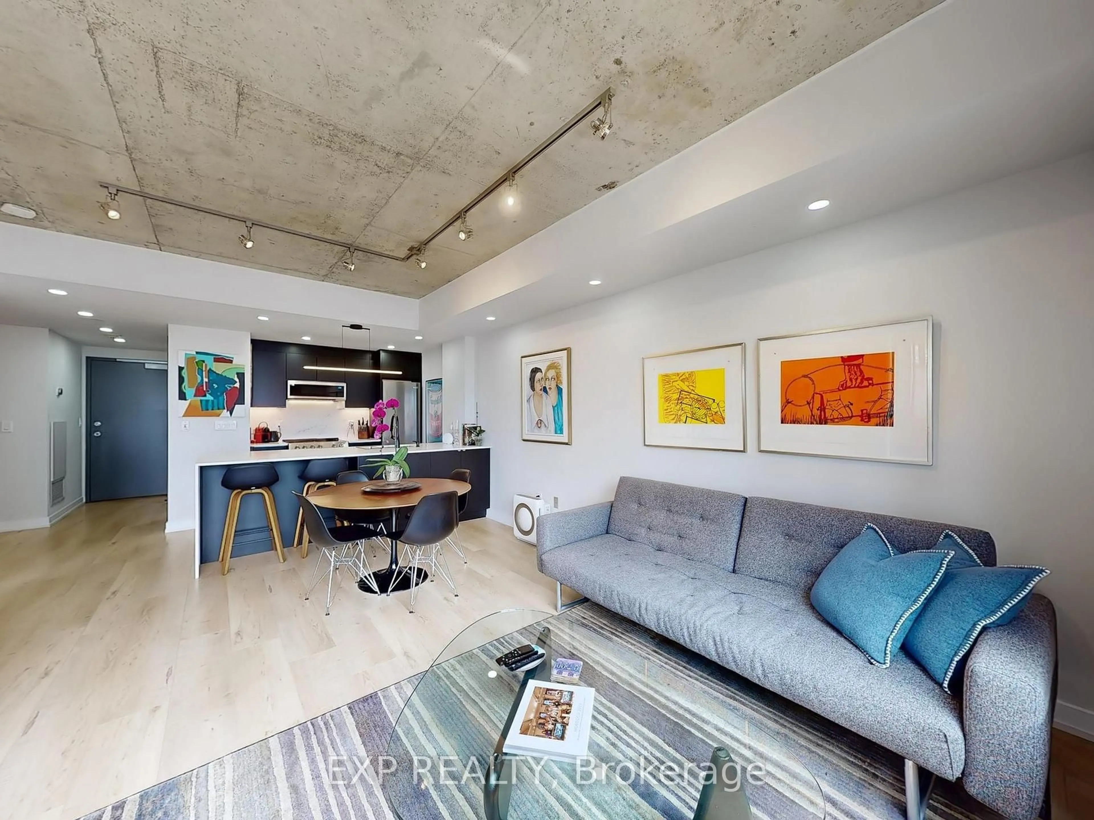Living room with furniture, cement floor for 285 Mutual St #1107, Toronto Ontario M4Y 3C5