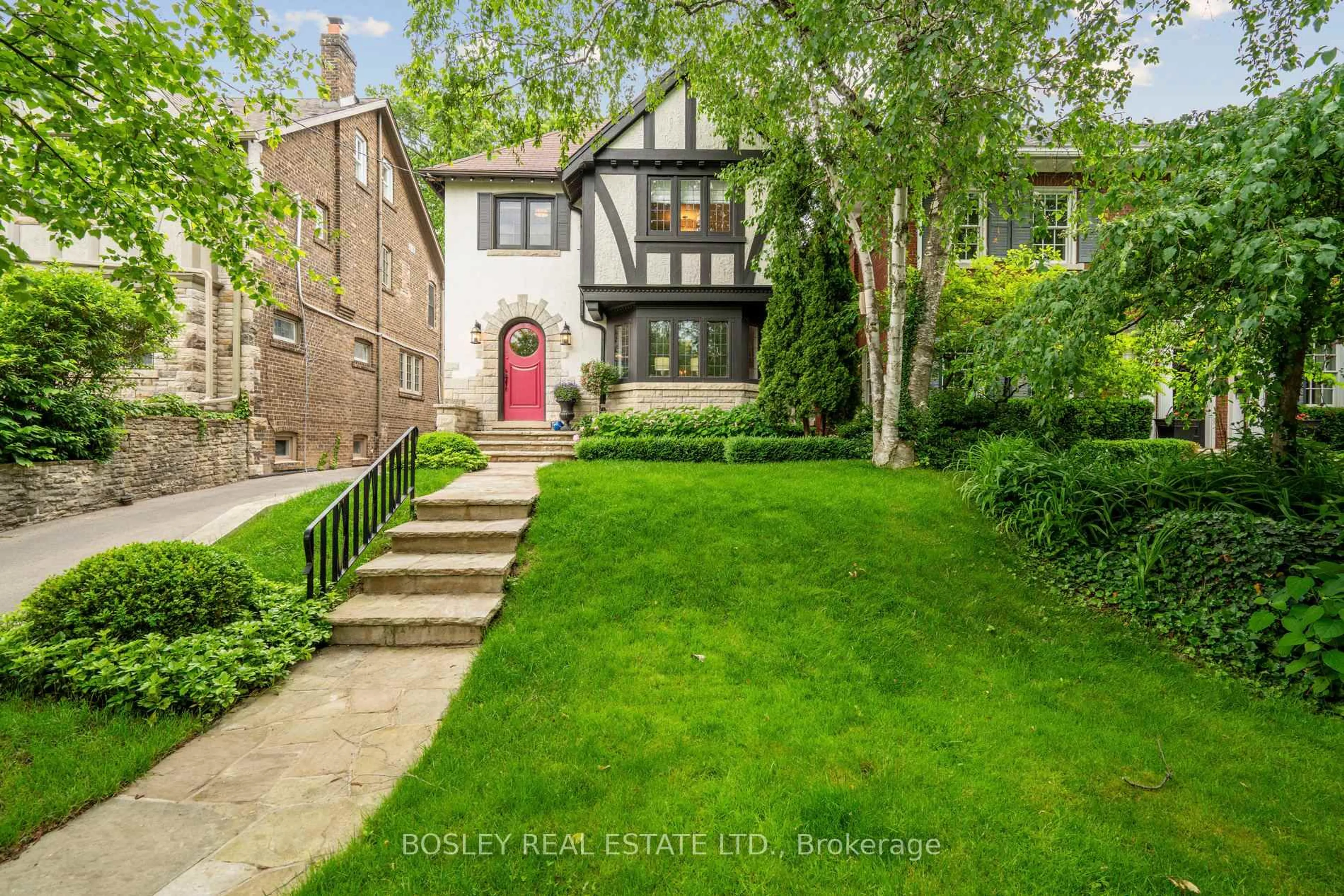 Home with brick exterior material, street for 294 Douglas Dr, Toronto Ontario M4W 2C2