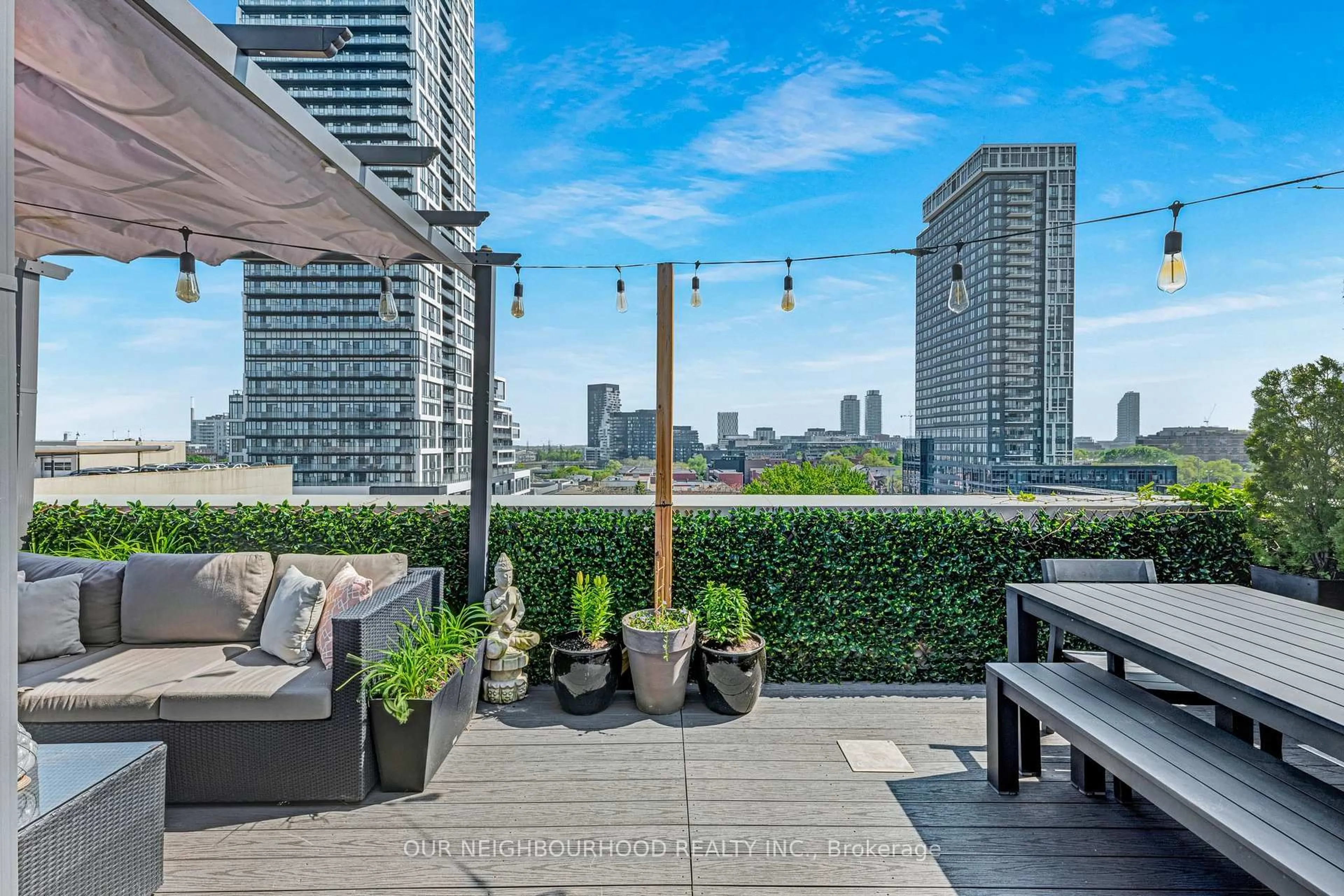 Patio, city buildings view from balcony for 736 Dundas St #PH2, Toronto Ontario M5A 2C5