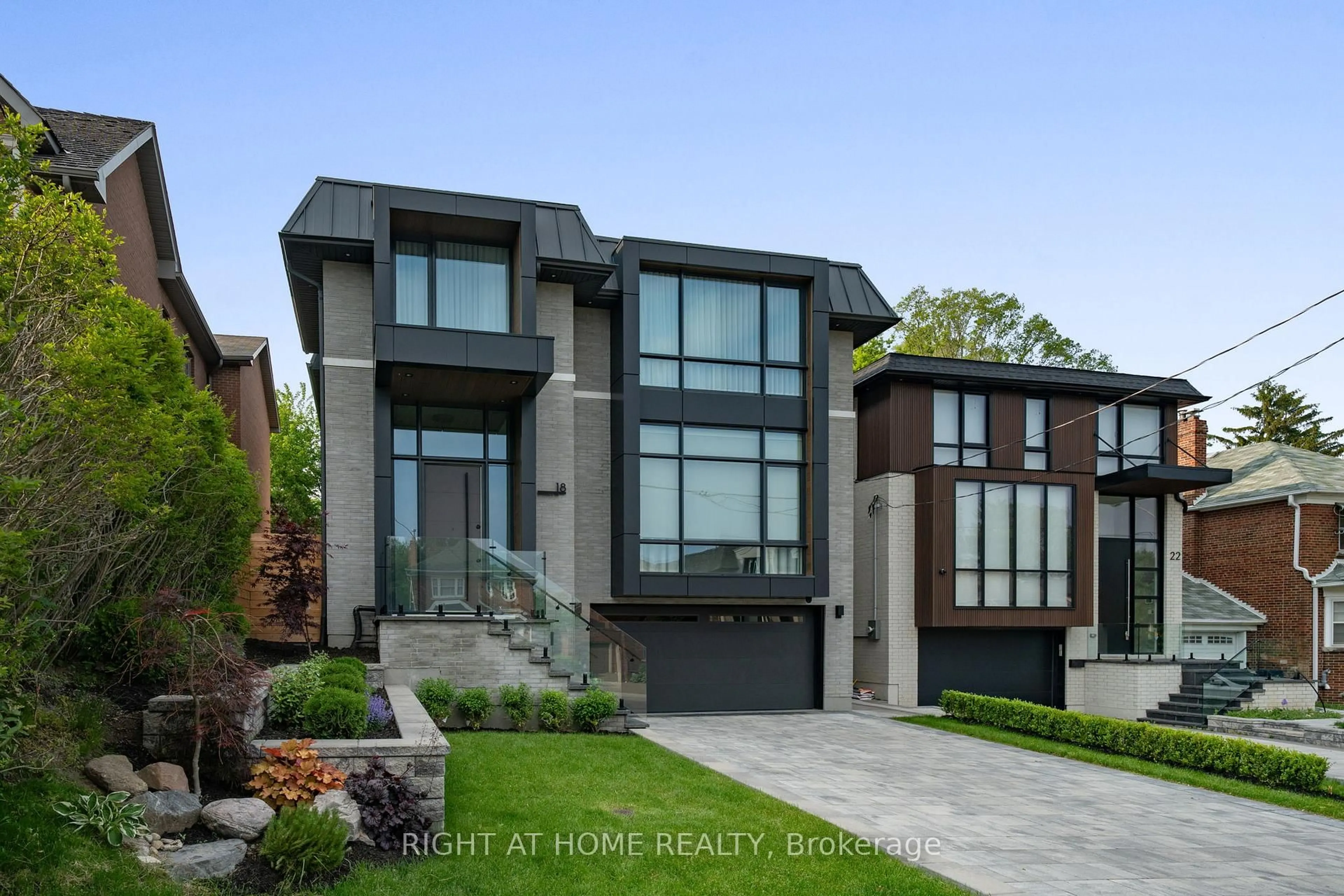 Home with brick exterior material, street for 18 Divadale Dr, Toronto Ontario M4G 2N9