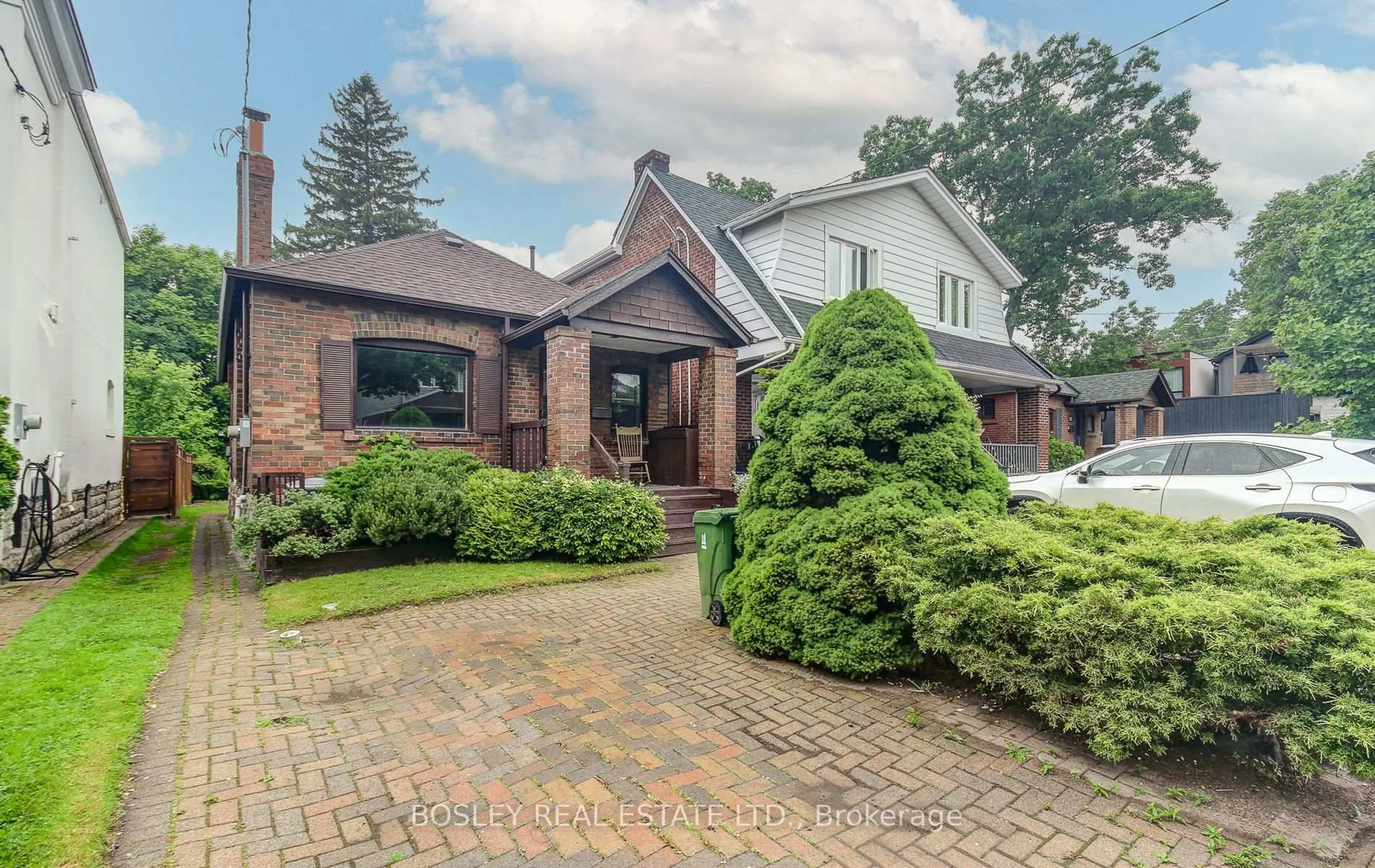 Home with brick exterior material, street for 52 Belcourt Rd, Toronto Ontario M4S 2T9