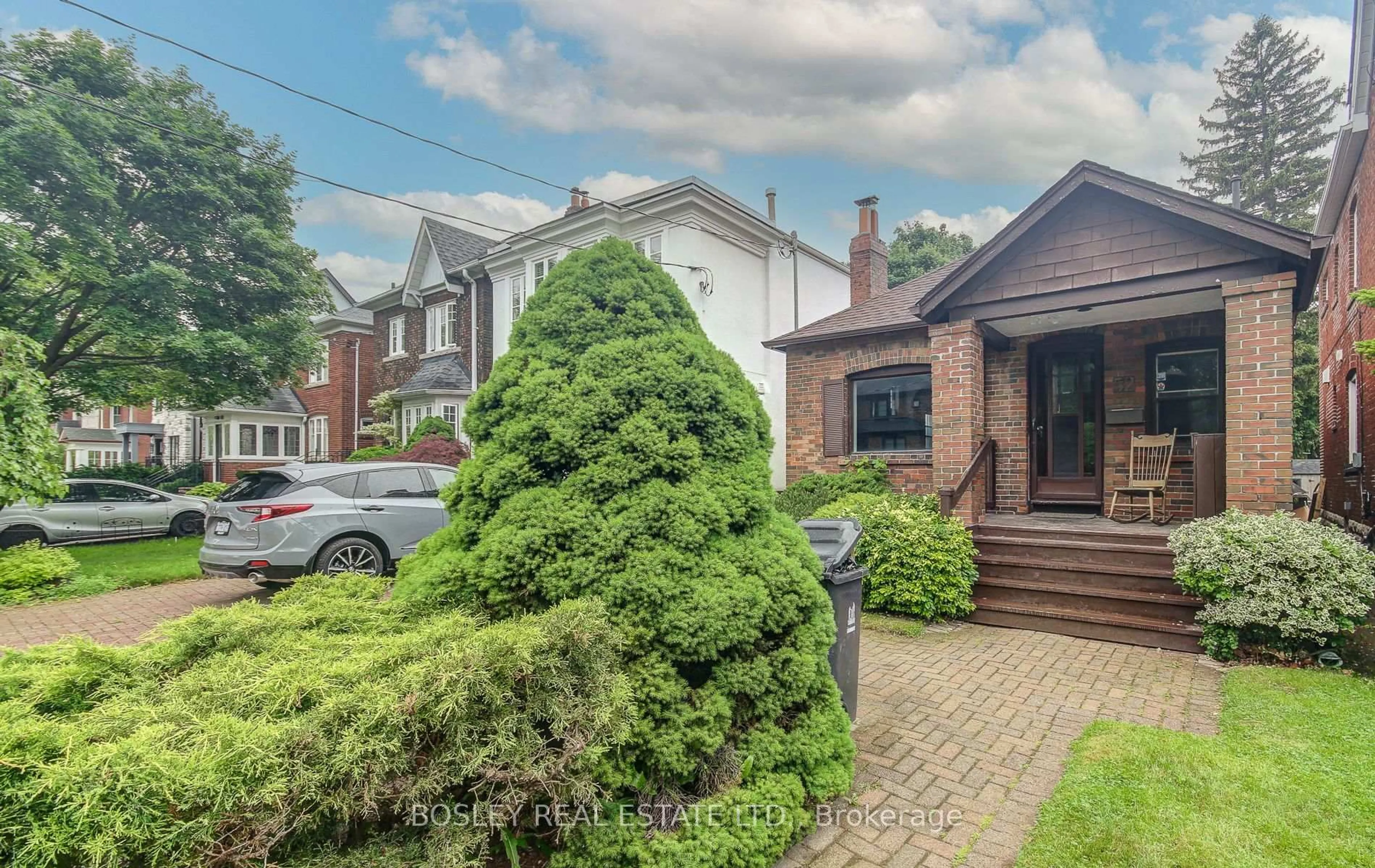 Home with brick exterior material, street for 52 Belcourt Rd, Toronto Ontario M4S 2T9