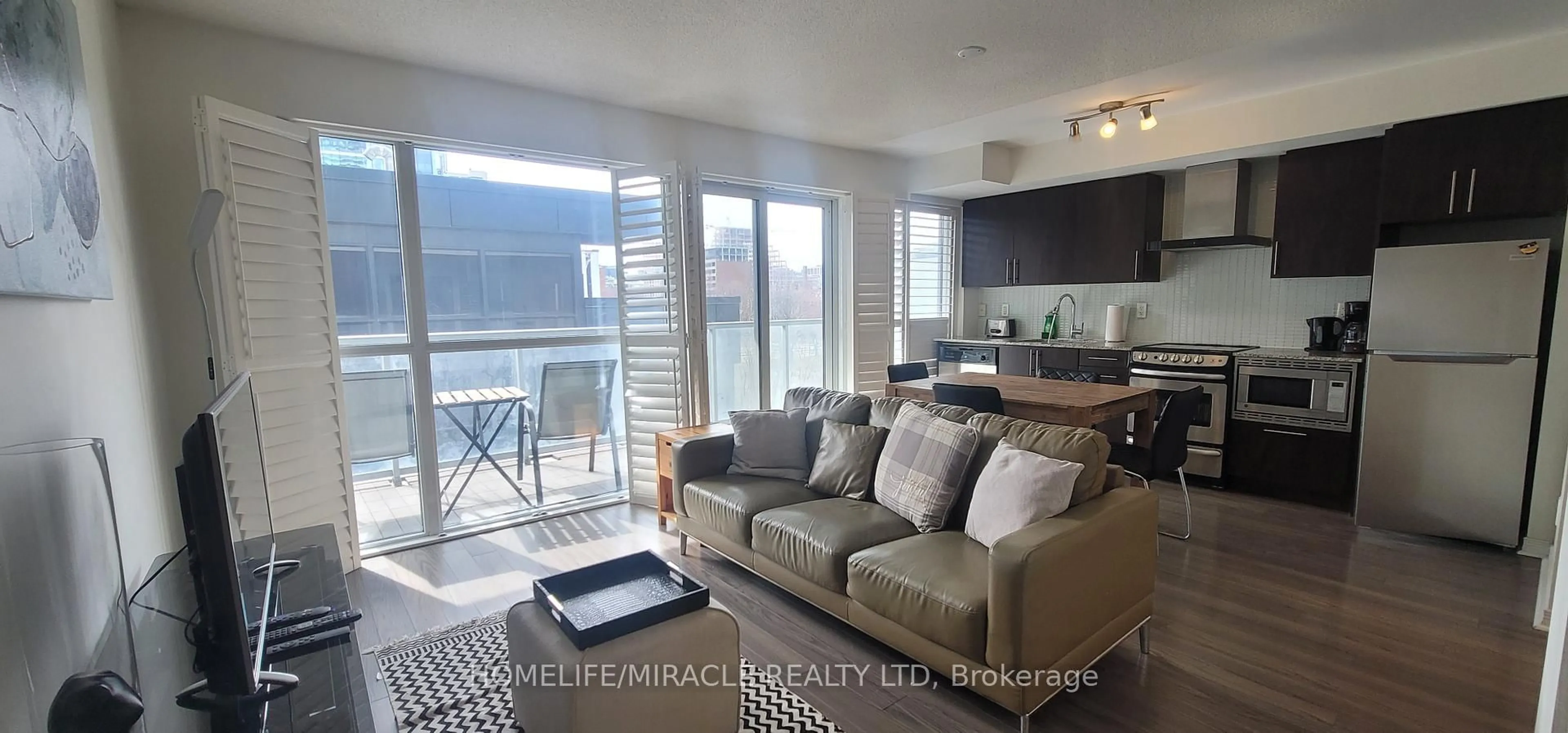 Living room with furniture, unknown for 352 Front St #414, Toronto Ontario M5V 0K3