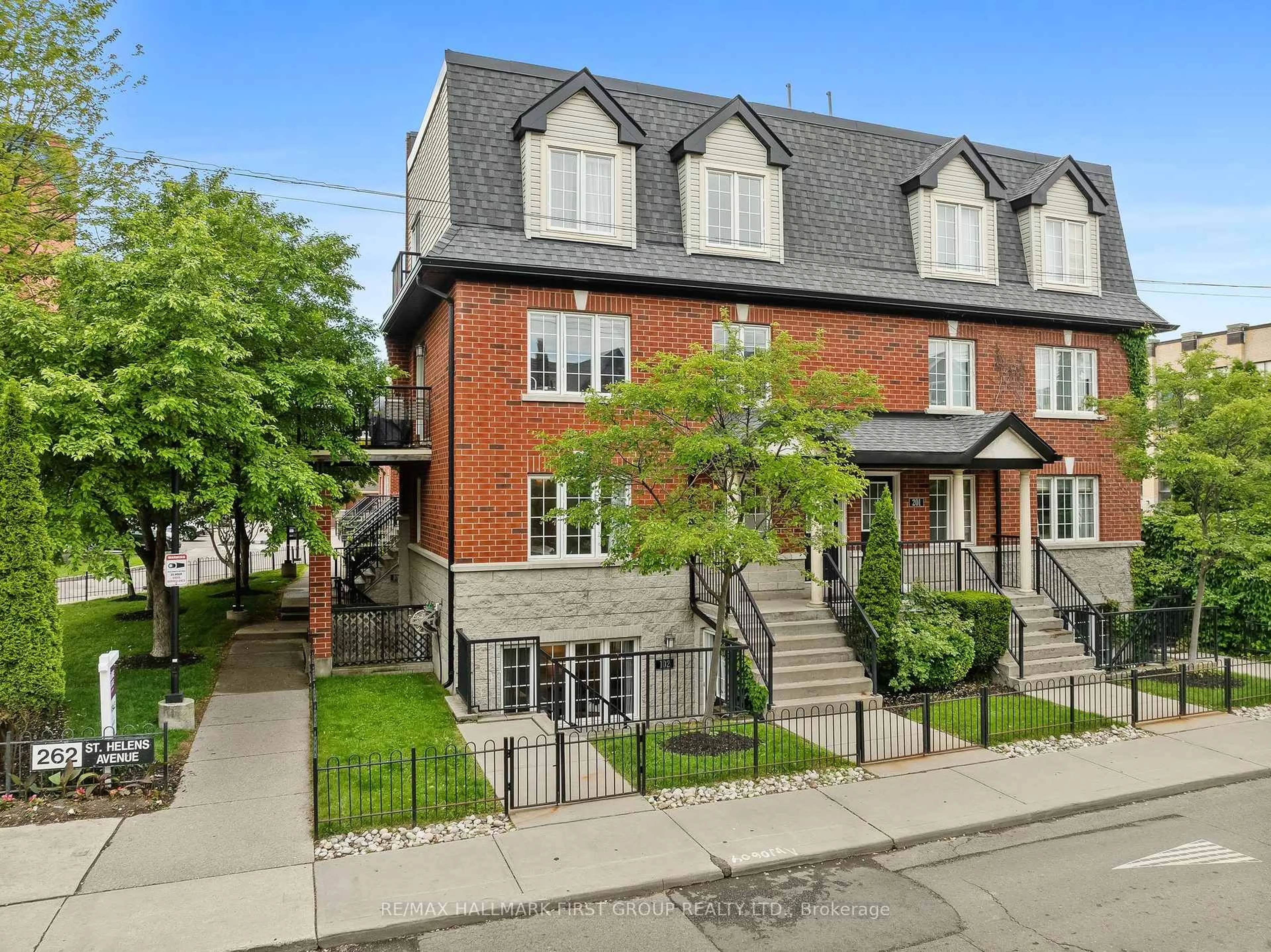 Home with brick exterior material, street for 262 St. Helen's Ave #102, Toronto Ontario M6H 4A4