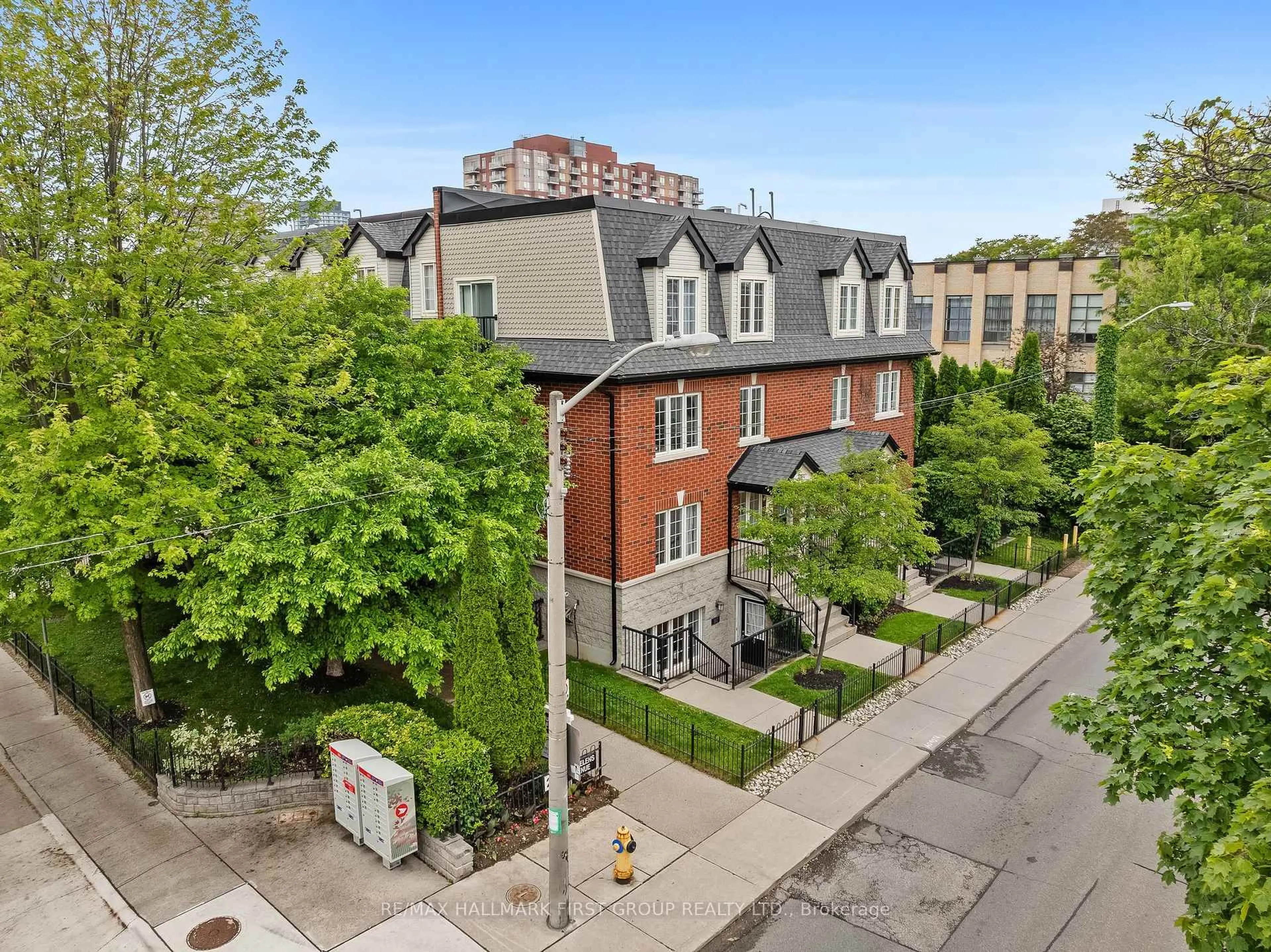 A pic from outside/outdoor area/front of a property/back of a property/a pic from drone, city buildings view from balcony for 262 St. Helen's Ave #102, Toronto Ontario M6H 4A4