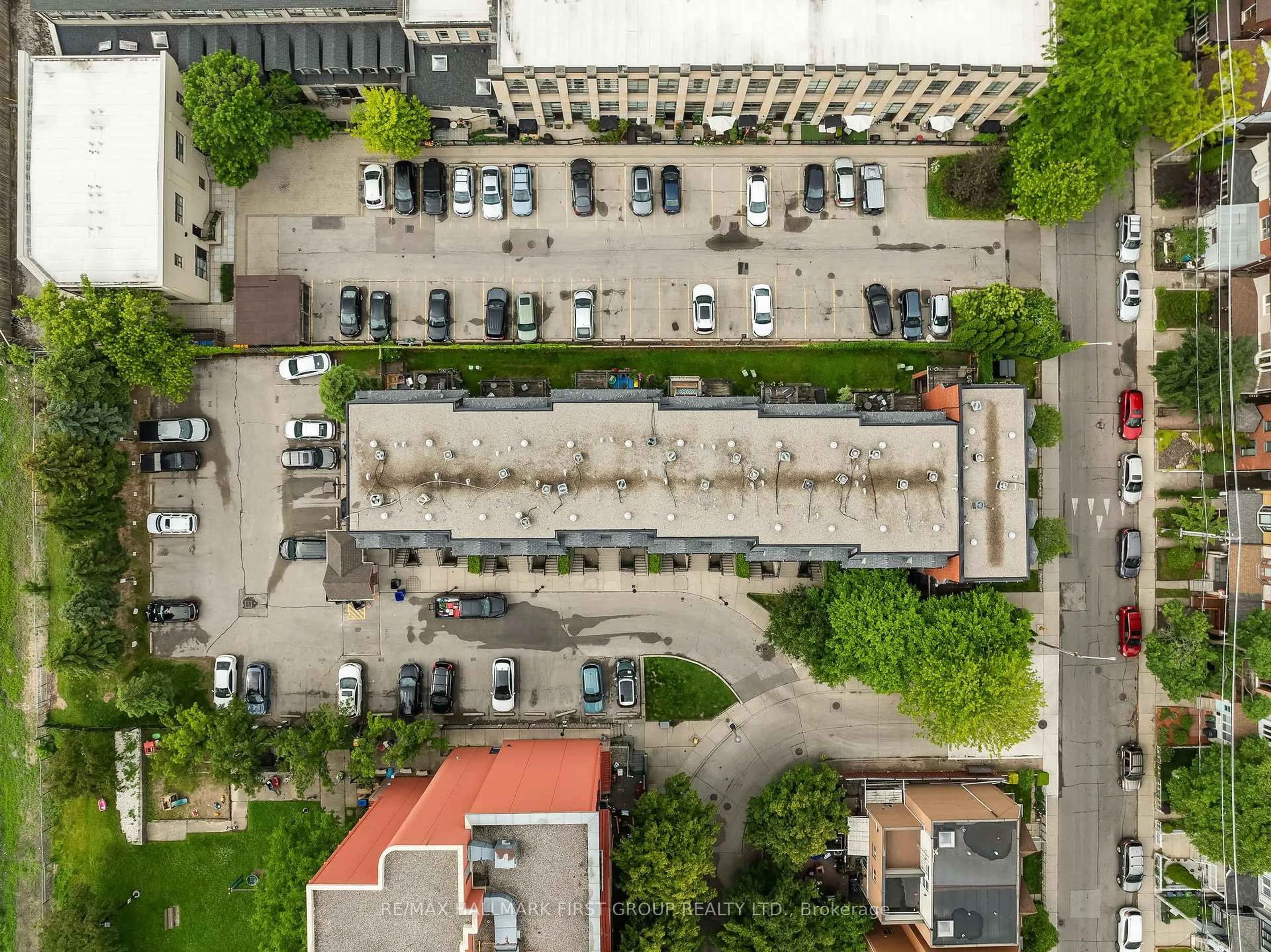 A pic from outside/outdoor area/front of a property/back of a property/a pic from drone, city buildings view from balcony for 262 St. Helen's Ave #102, Toronto Ontario M6H 4A4