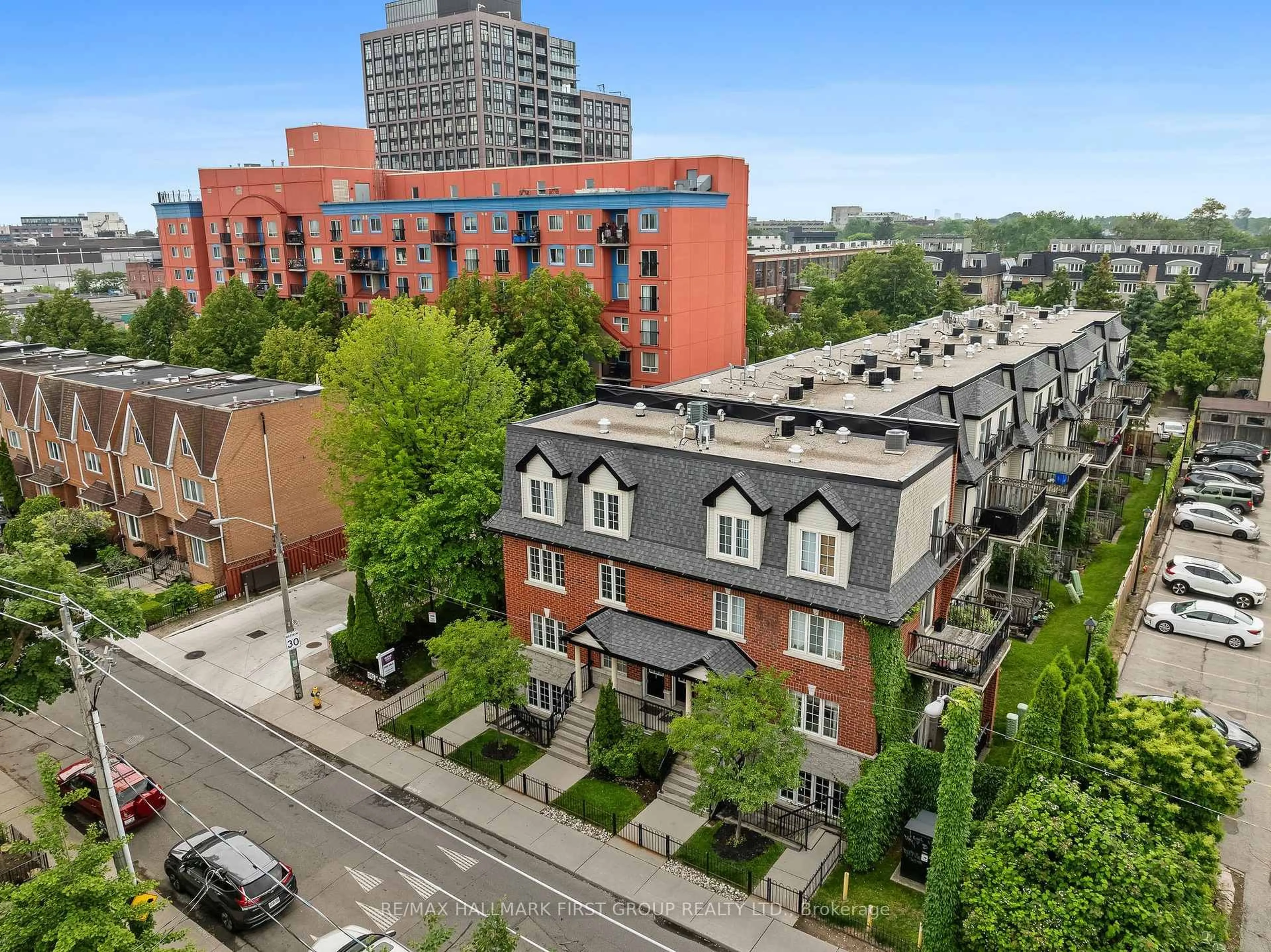 A pic from outside/outdoor area/front of a property/back of a property/a pic from drone, city buildings view from balcony for 262 St. Helen's Ave #102, Toronto Ontario M6H 4A4