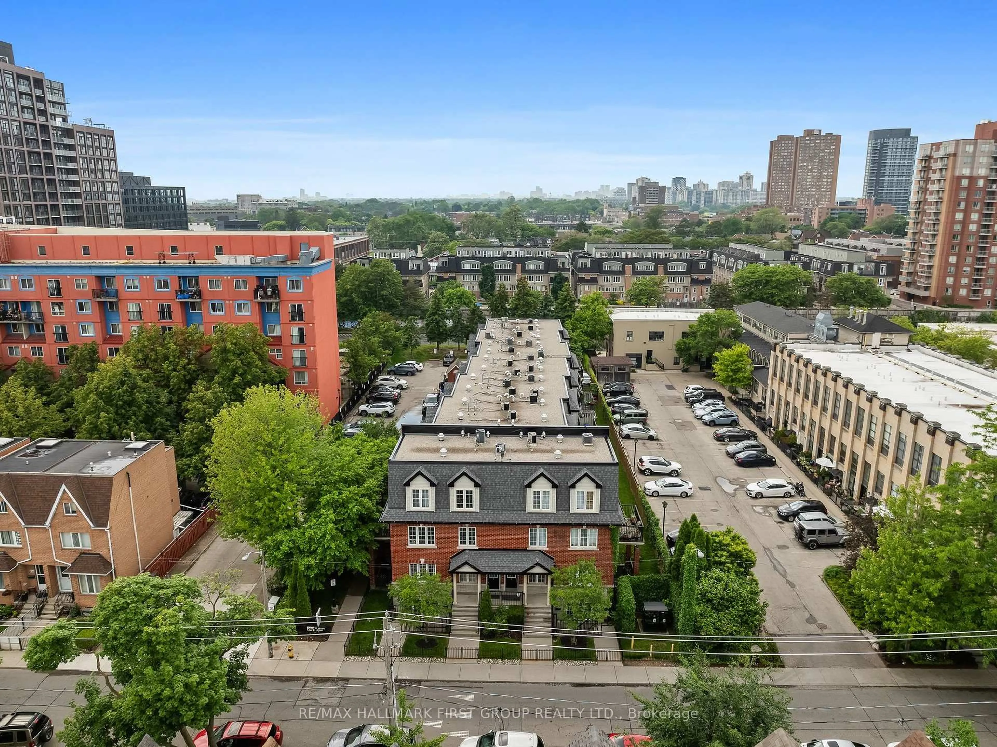 A pic from outside/outdoor area/front of a property/back of a property/a pic from drone, city buildings view from balcony for 262 St. Helen's Ave #102, Toronto Ontario M6H 4A4