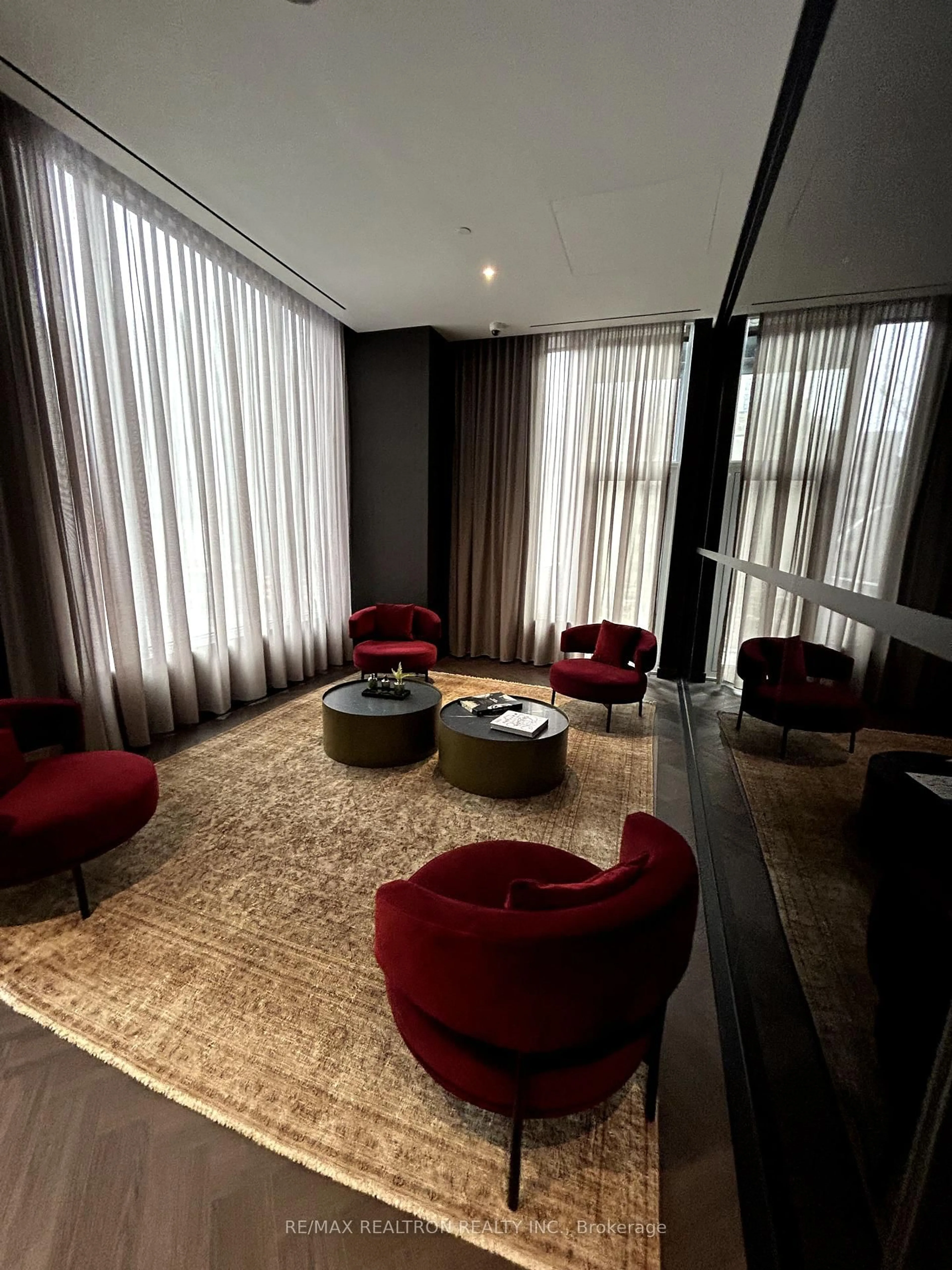 Living room with furniture, carpet floor for 11 Yorkville Ave #5804, Toronto Ontario M4W 1L2