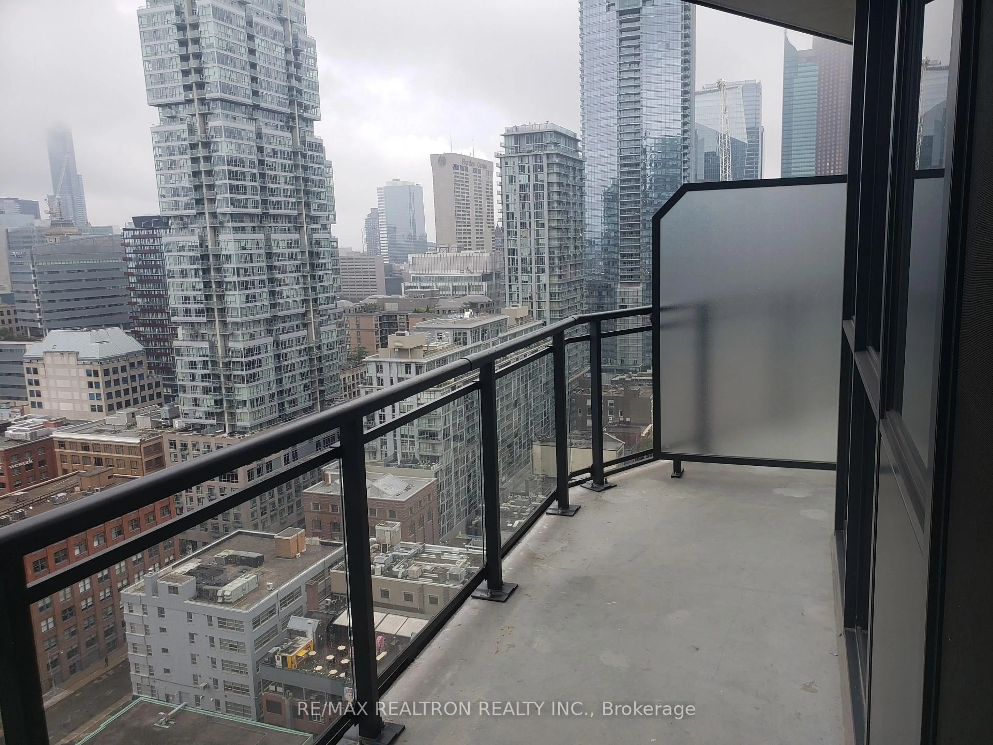 Balcony in the apartment, city buildings view from balcony for 99 John St #2307, Toronto Ontario M5V 0S6