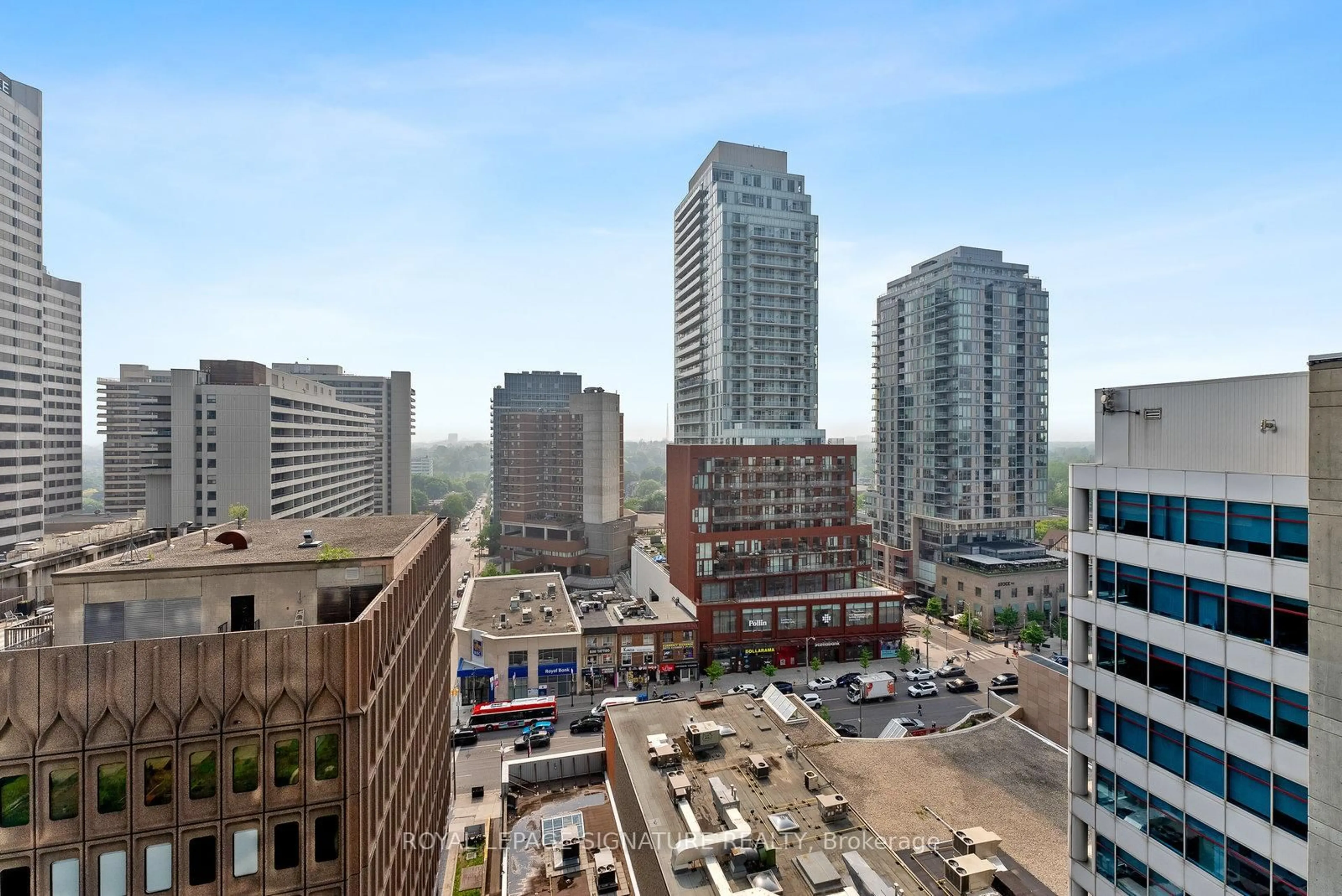 Patio, city buildings view from balcony for 30 Roehampton Ave #1505, Toronto Ontario M4P 1R2