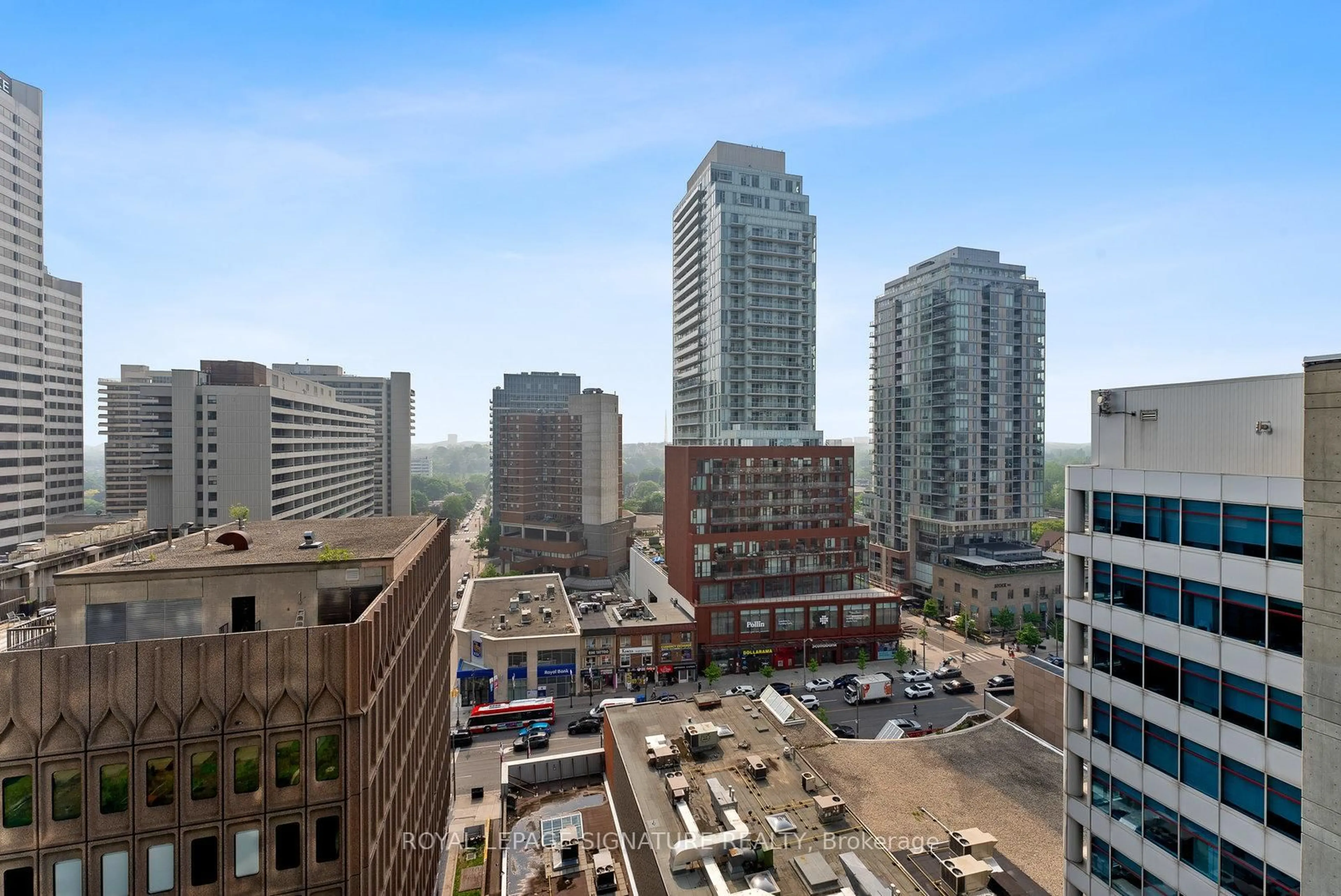 Patio, city buildings view from balcony for 30 Roehampton Ave #1505, Toronto Ontario M4P 1R2