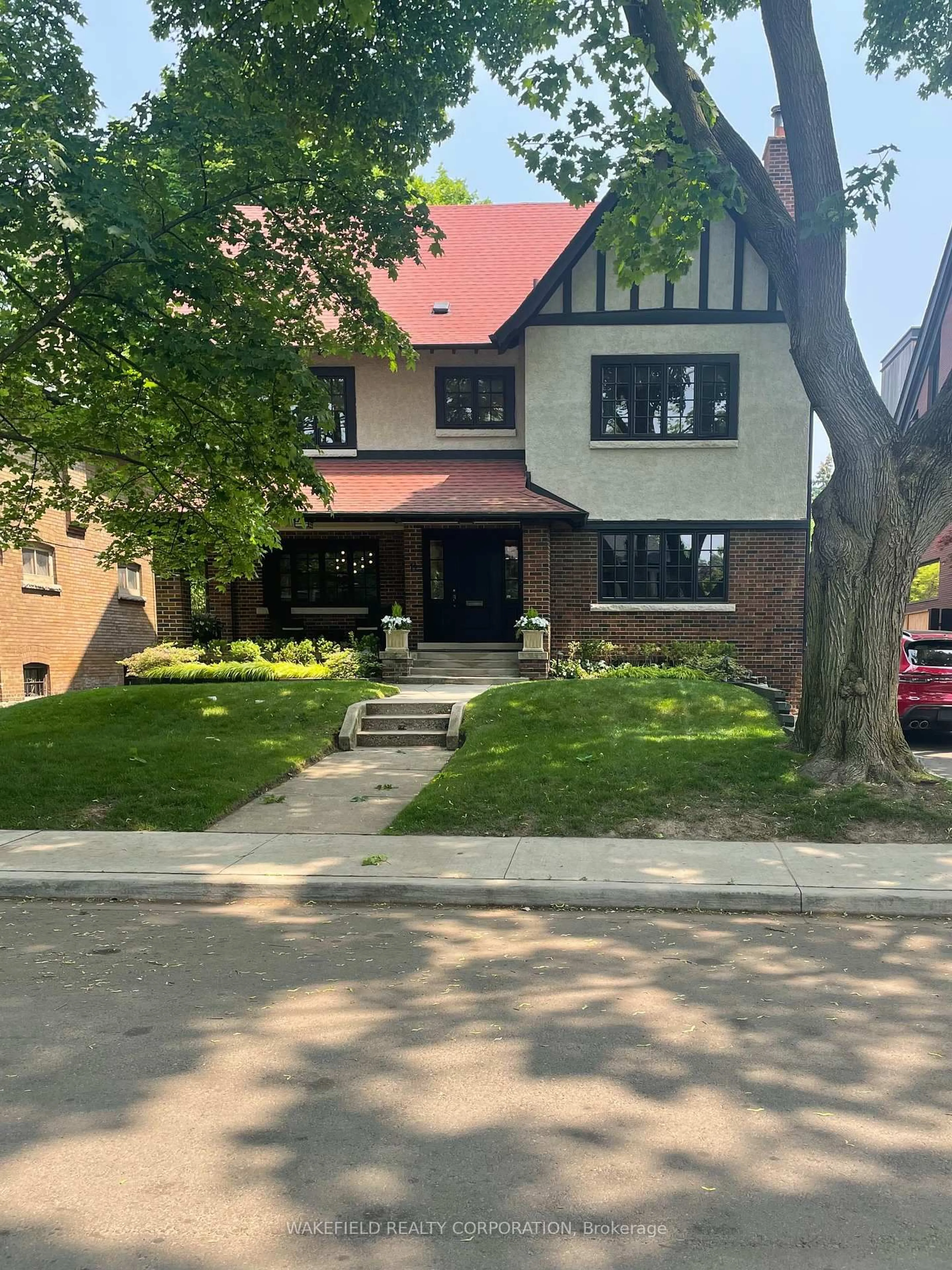Home with brick exterior material, street for 11 Conrad Ave, Toronto Ontario M6G 3G4