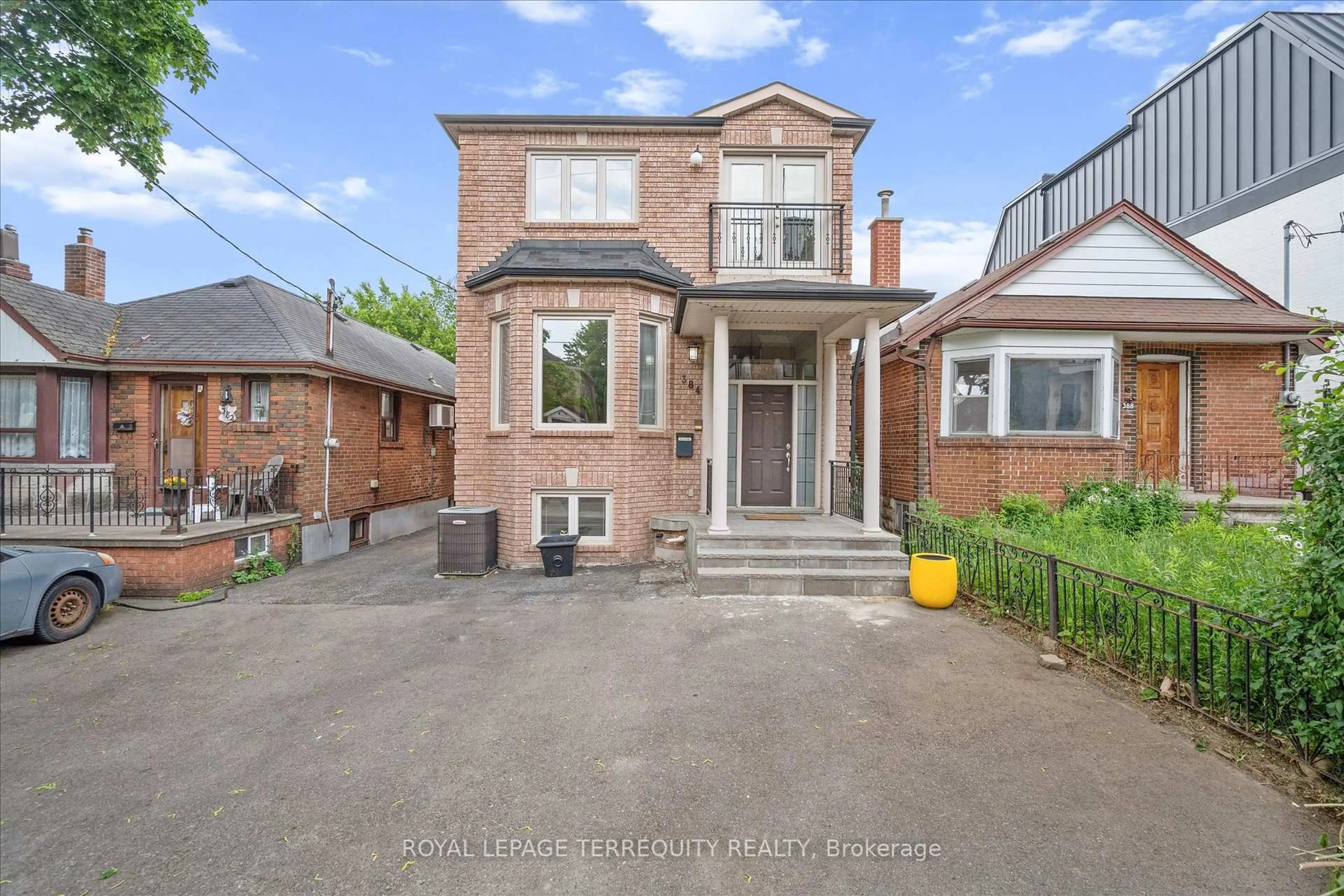 Home with brick exterior material, street for 384 Winnett Ave, Toronto Ontario M6C 3M1