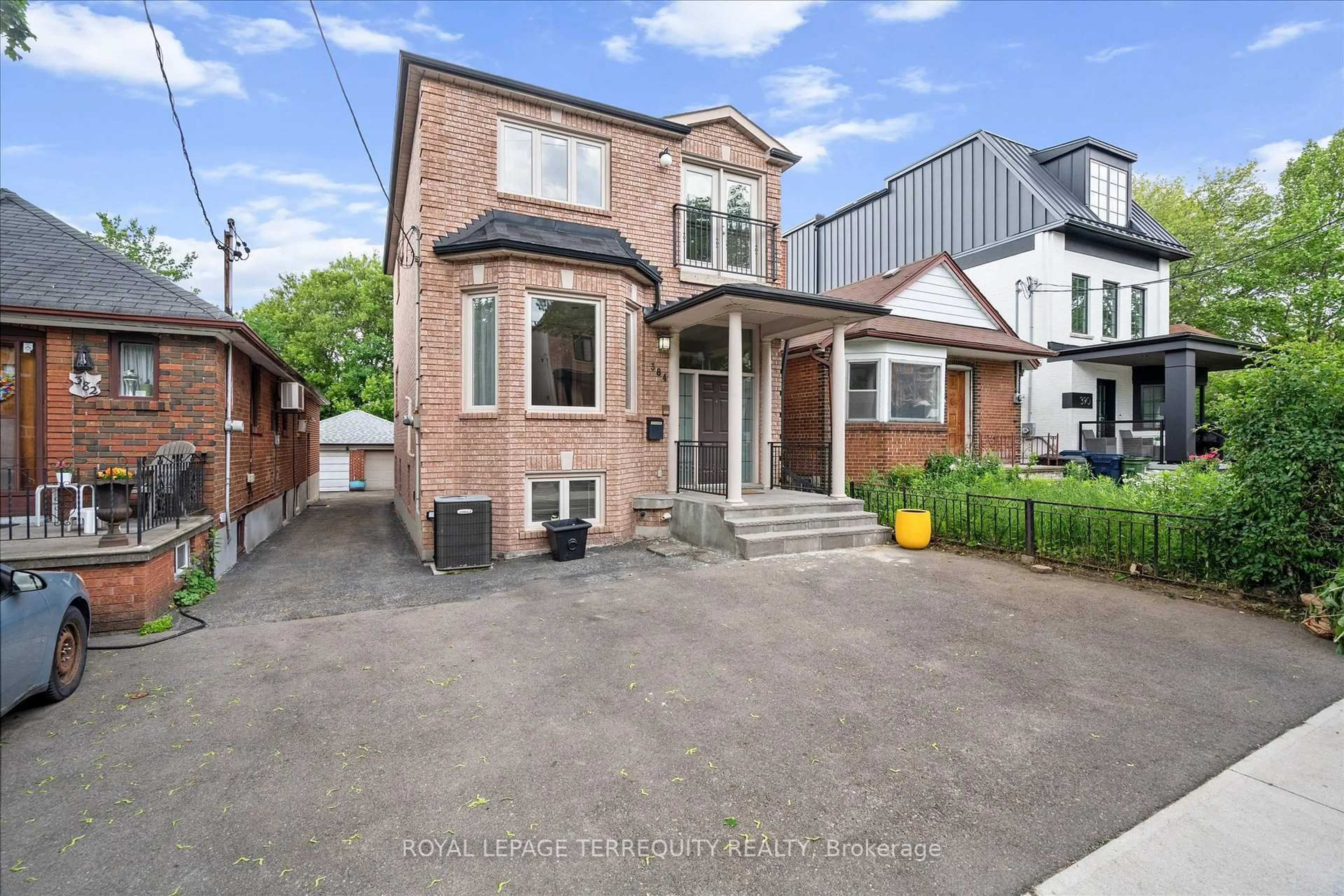Home with brick exterior material, street for 384 Winnett Ave, Toronto Ontario M6C 3M1