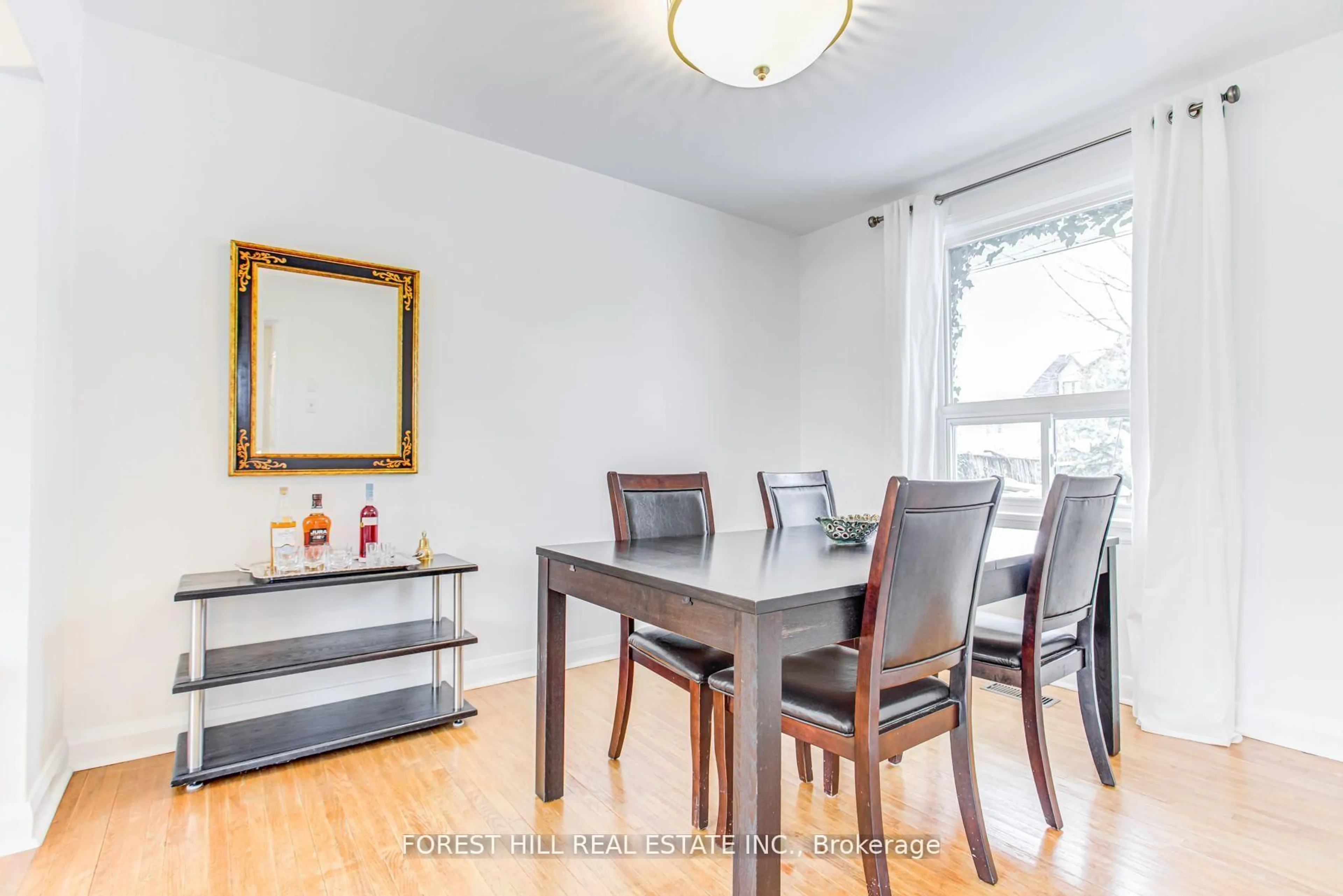 Dining room, wood/laminate floor for 63 Moore Park Ave, Toronto Ontario M2M 1M8