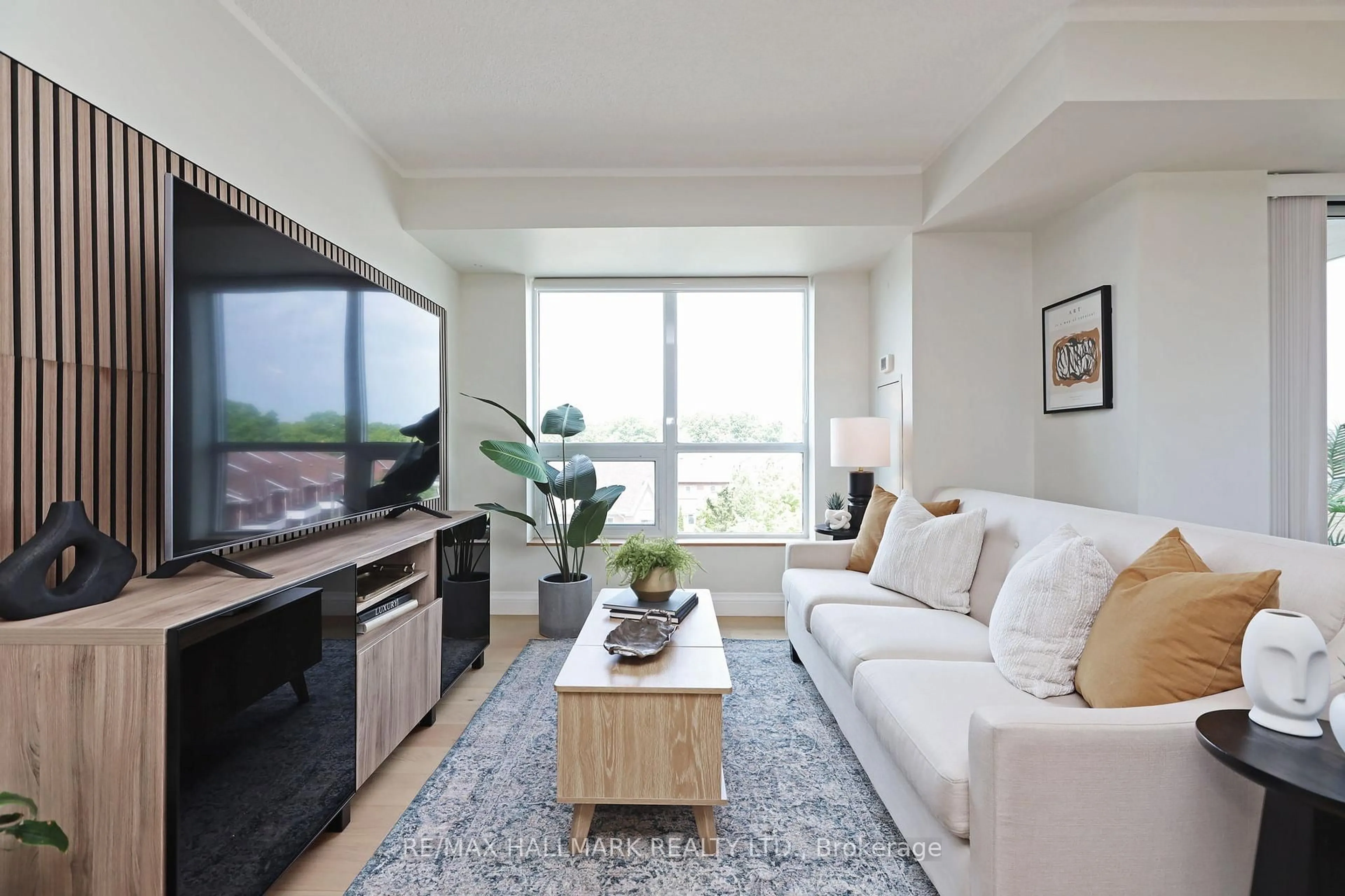 Living room with furniture, unknown for 120 Dallimore Circ #407, Toronto Ontario M3C 4J1