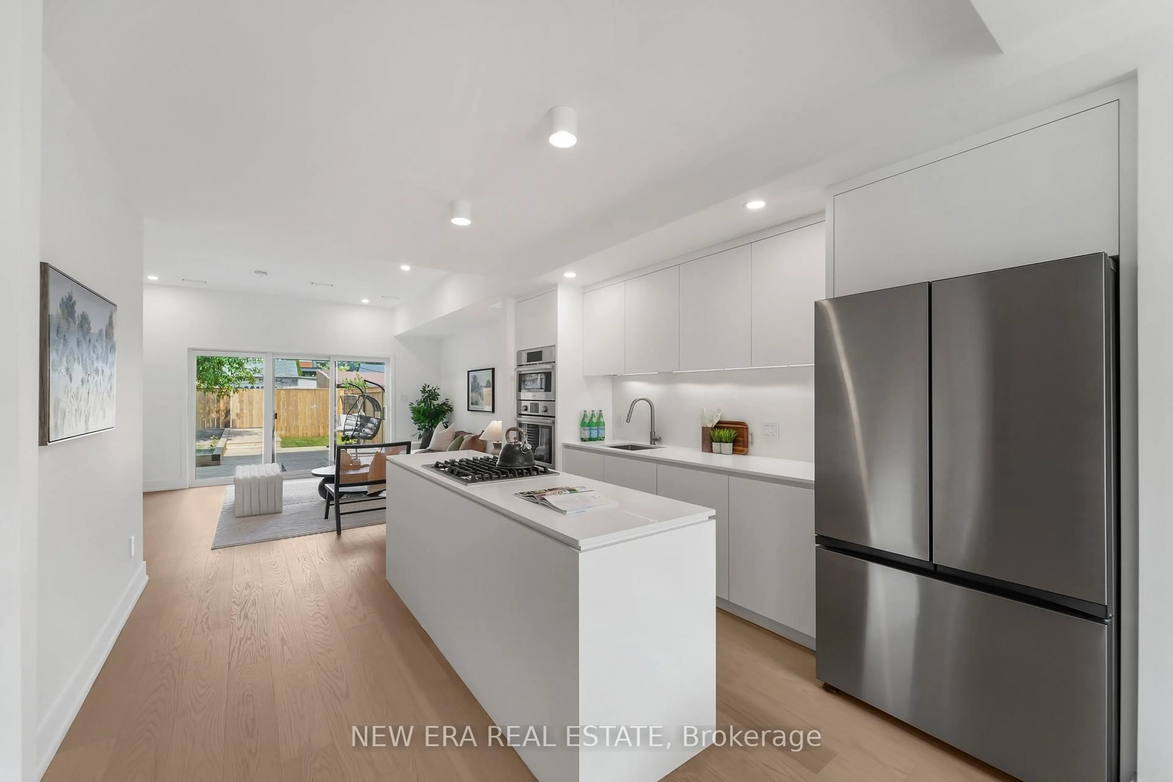 Open concept kitchen, ceramic/tile floor for 113 Bellwoods Ave, Toronto Ontario M6J 3N4