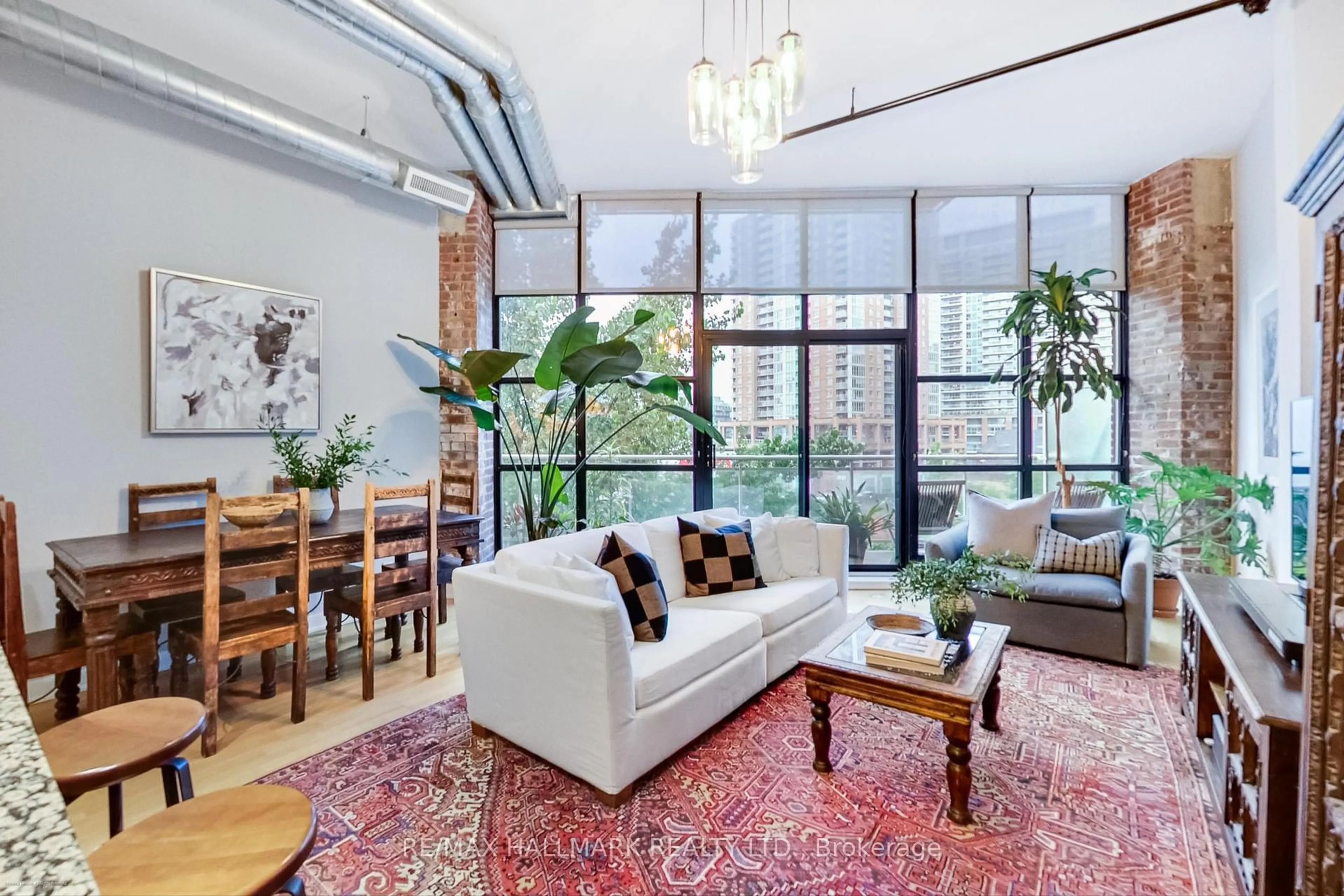 Living room with furniture, unknown for 43 Hanna Ave #409, Toronto Ontario M6K 1X1