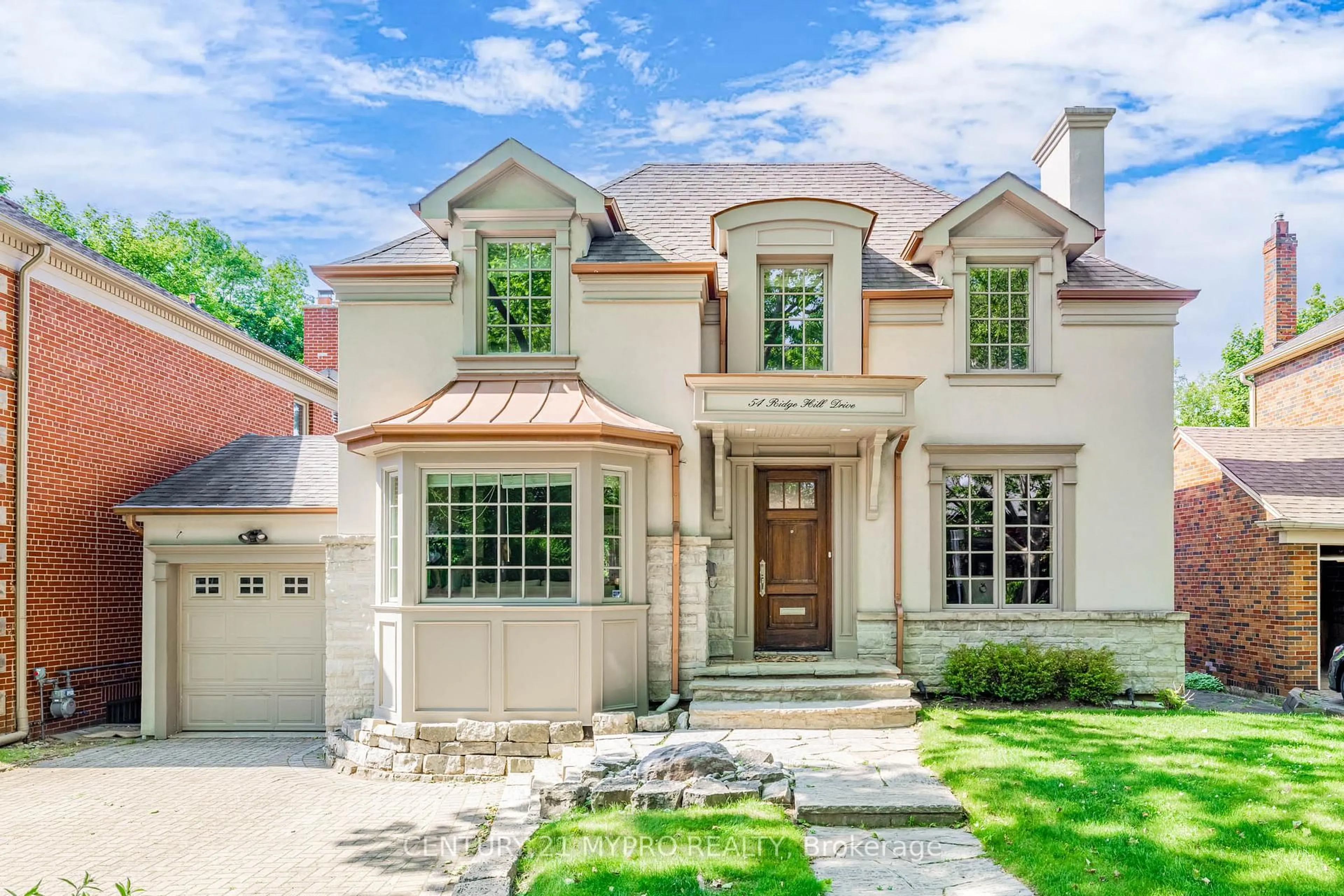Home with brick exterior material, street for 54 Ridge Hill Dr, Toronto Ontario M6C 2J4