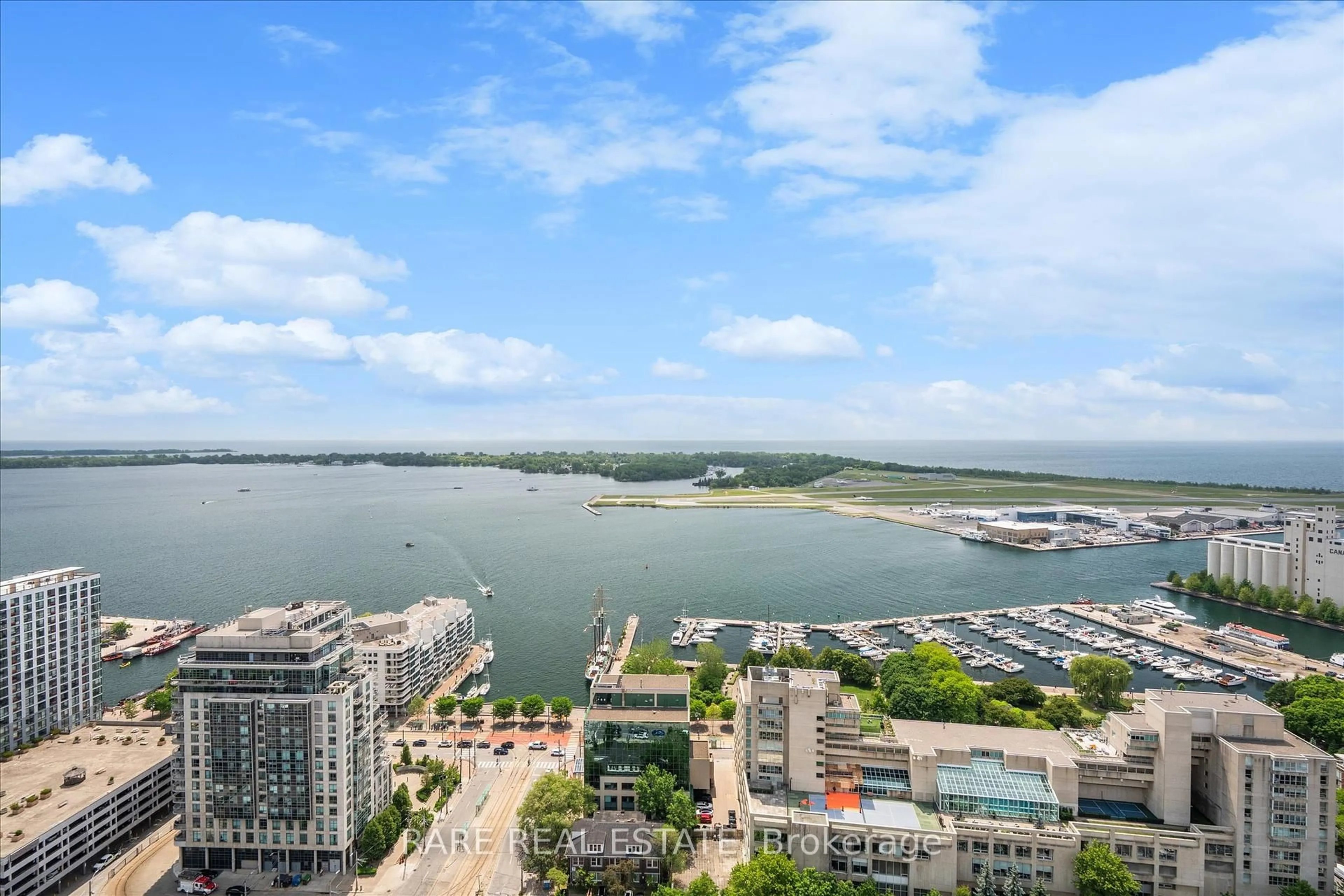 A pic from outside/outdoor area/front of a property/back of a property/a pic from drone, water/lake/river/ocean view for 11 Brunel Crt #4115, Toronto Ontario M5V 3Y3