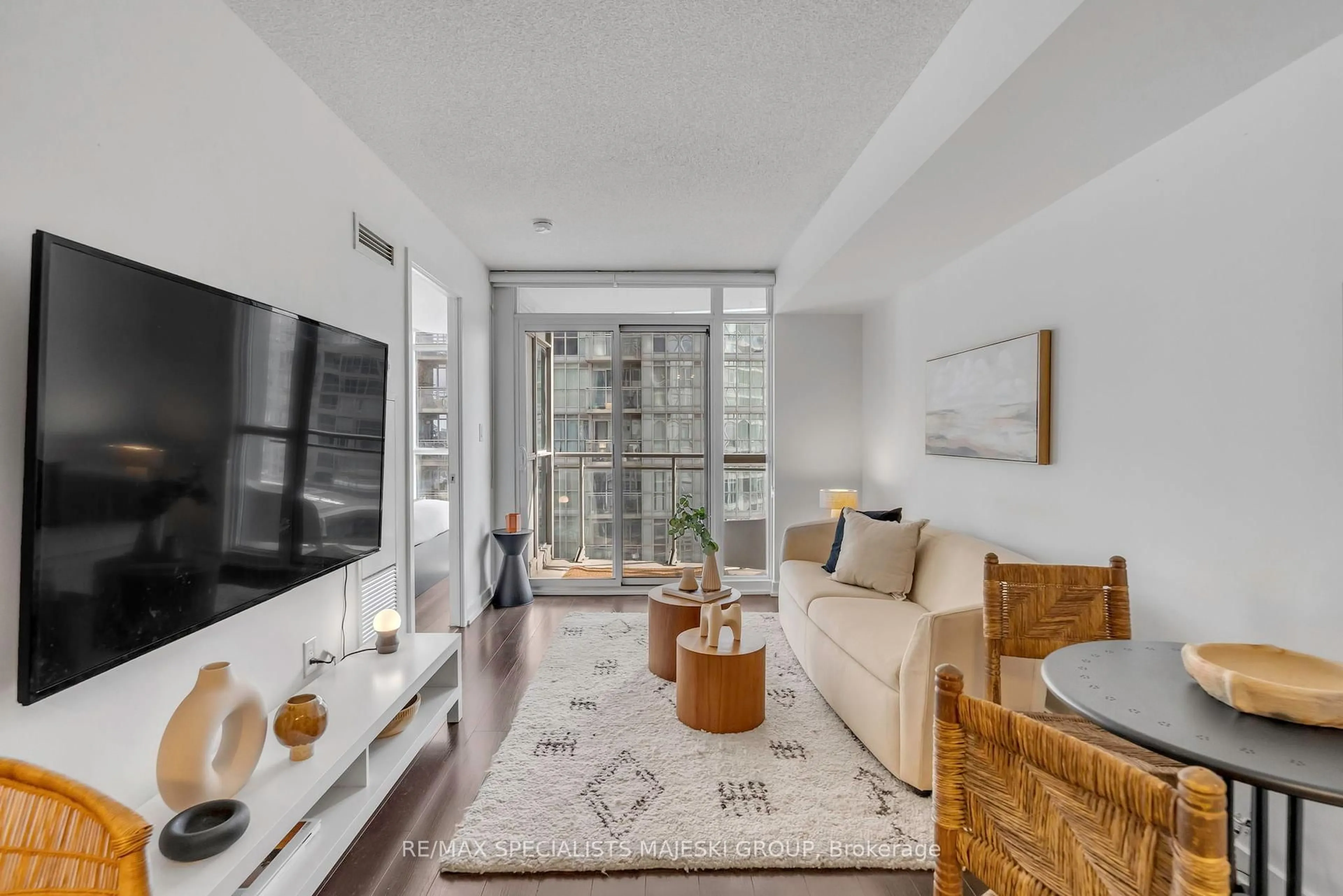 Living room with furniture, unknown for 21 Iceboat Terr #1705, Toronto Ontario M5V 4A9
